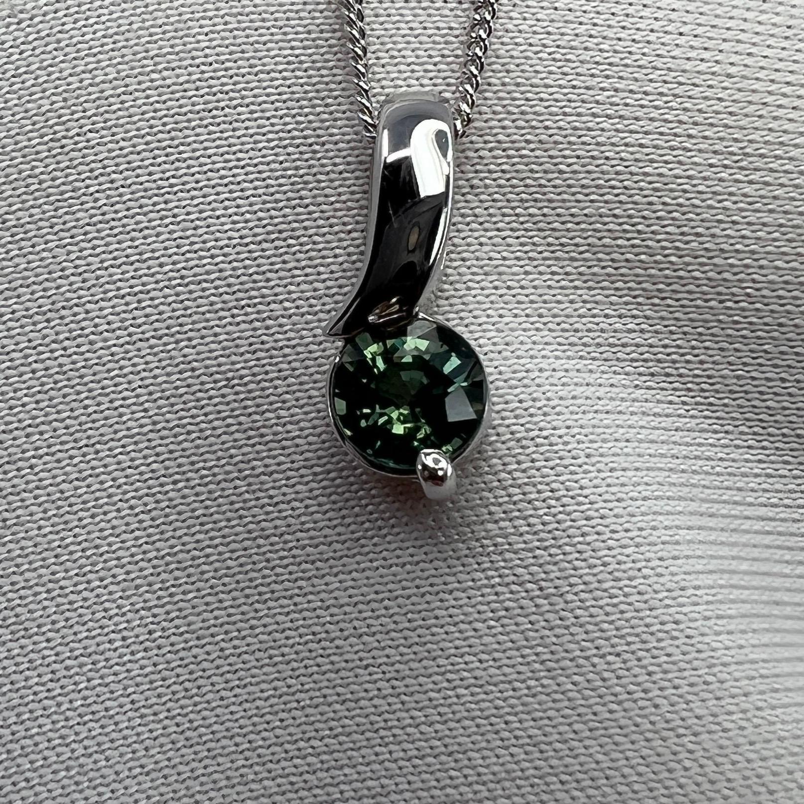 Fine Vivid Green Blue Untreated Australian Sapphire Round Cut 18k White Gold Solitaire Drop Pendant.

0.56 Carat sapphire with a beautiful vivid green blue colour and excellent clarity, very clean stone. Also has an excellent round brilliant cut
