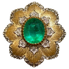 Anillo de Esmeralda y Diamantes en Oro Amarillo y Blanco de 18K