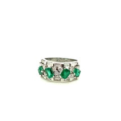 Anello di fidanzamento a eternità in oro con smeraldo verde vivo e diamante bianco