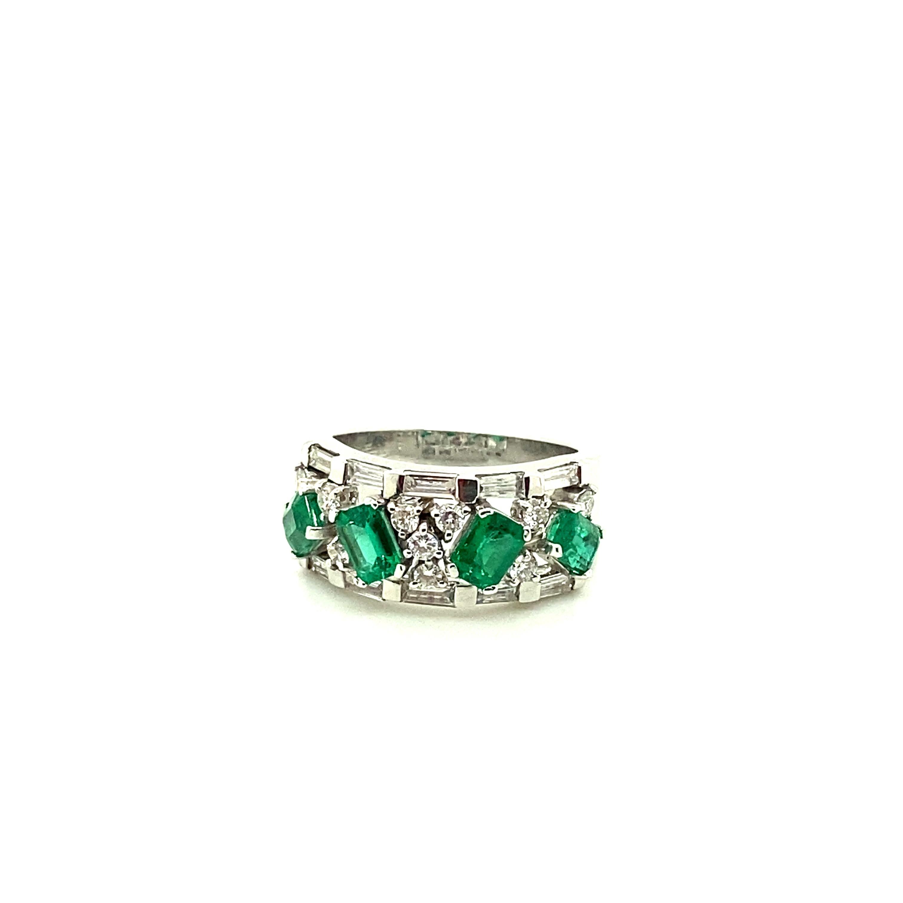 Vivid Green Emerald and White Diamond Gold Eternity Ring:

A beautiful ring, it features four octagon-cut vivid green emeralds weighing 1.28 carat surrounded by a flurry of white diamonds weighing 0.78 carat. The emeralds are of vivid green colour,