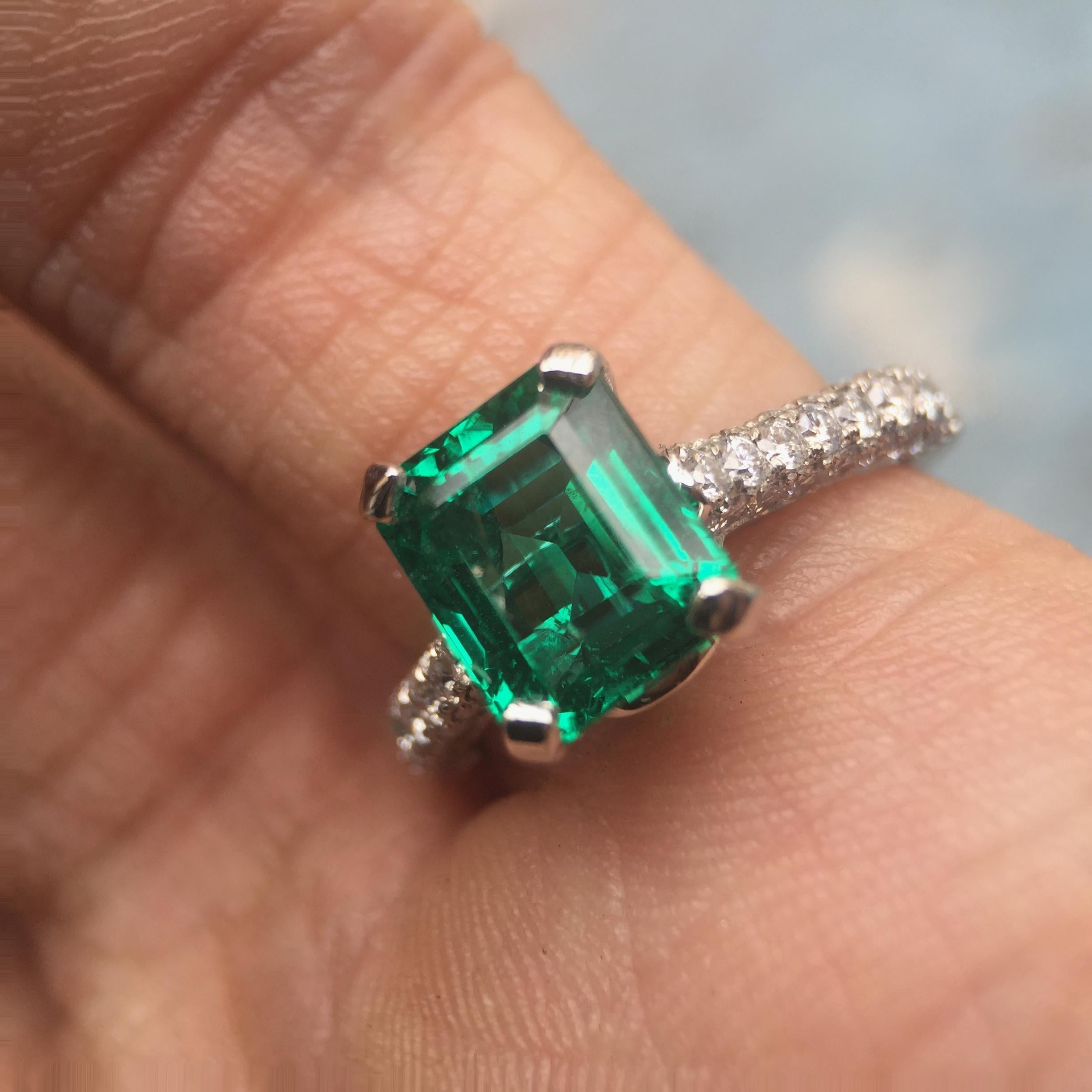 Vivid Green Emerald With Pave Diamond Down Shank - 3 Carat + TW - Platinum

Ring May be made to order from scratch to accommodate your exact finger size 
or a different stone if the budget requires it, takes approximately 3-6 weeks

Setting with no