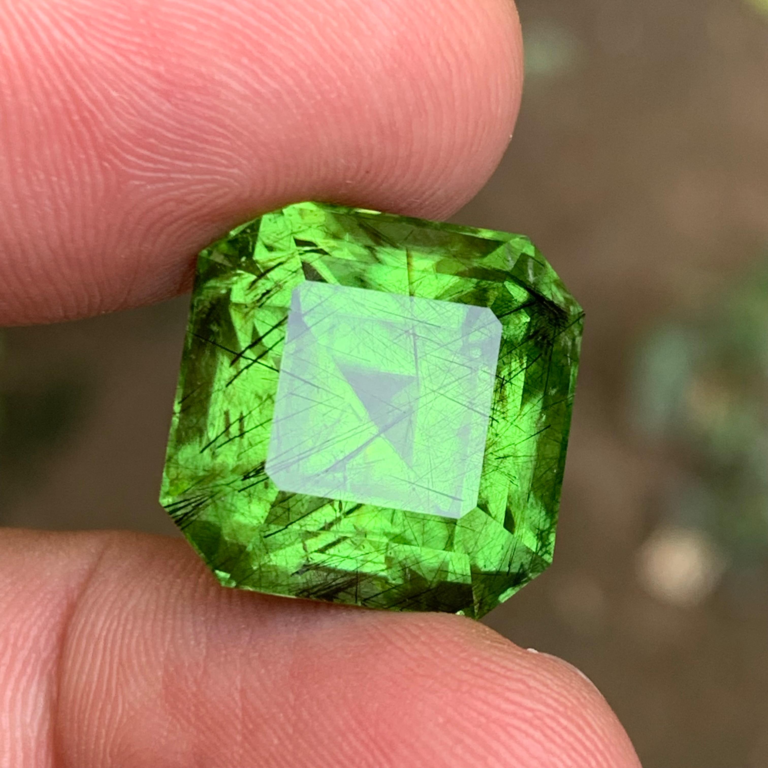 Contemporary Vivid Green Natural Rutile/Ludwigite Peridot Loose Gemstone 29.62 Ct Emerald Cut For Sale