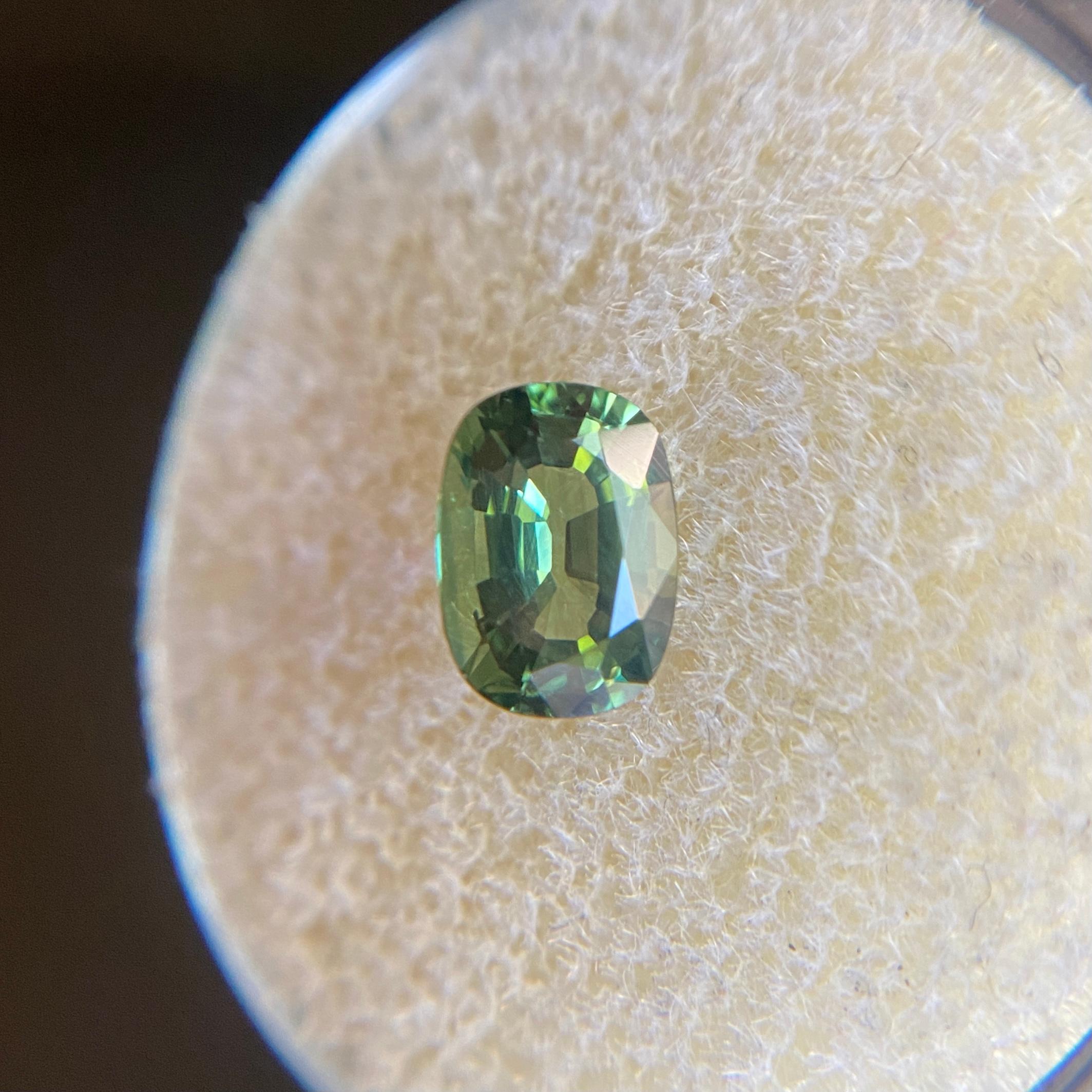 Natural Vivid Green Thai Sapphire.

1.19 Carat with a beautiful vivid green colour and a an excellent cushion cut with ideal polish to show great shine and colour, would look lovely in jewellery. Also has good clarity, some natural inclusions