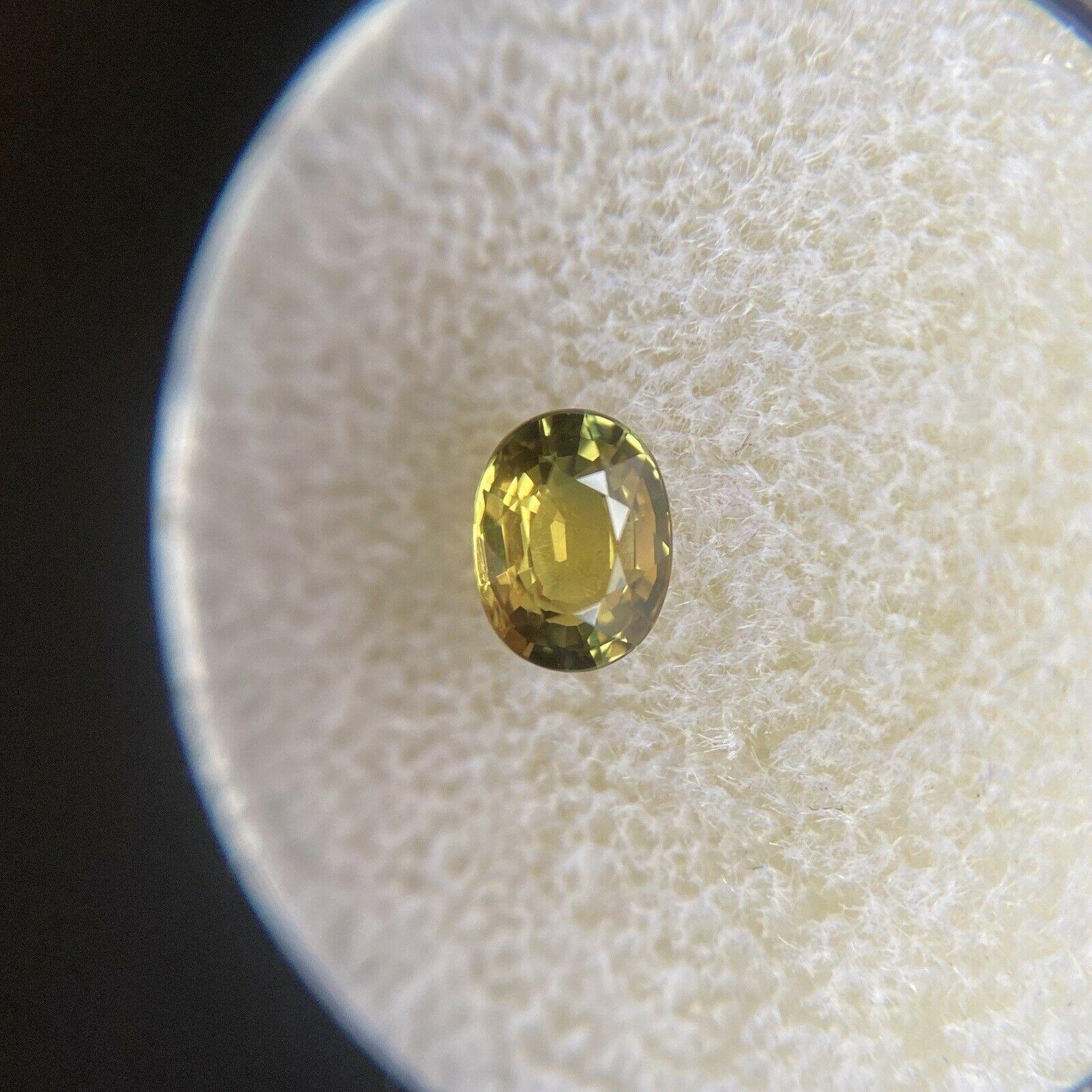 Vivid Green Yellow Untreated Sapphire 0.68ct Oval Cut Untreated Gem In New Condition In Birmingham, GB