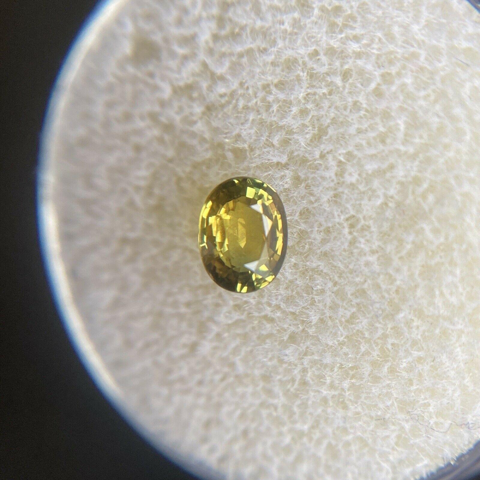 Women's or Men's Vivid Green Yellow Untreated Sapphire 0.68ct Oval Cut Untreated Gem