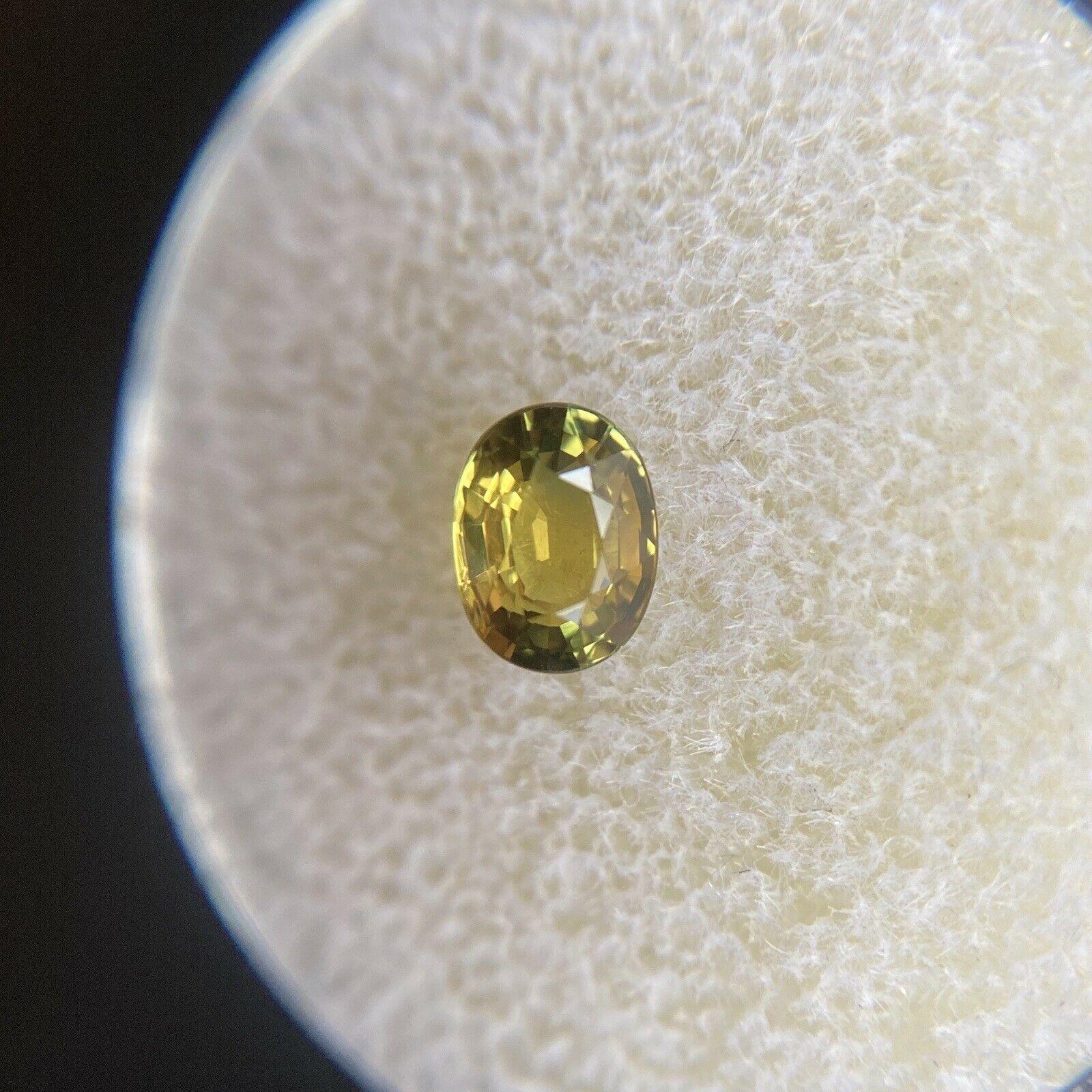 Vivid Green Yellow Untreated Sapphire 0.68ct Oval Cut Untreated Gem 1