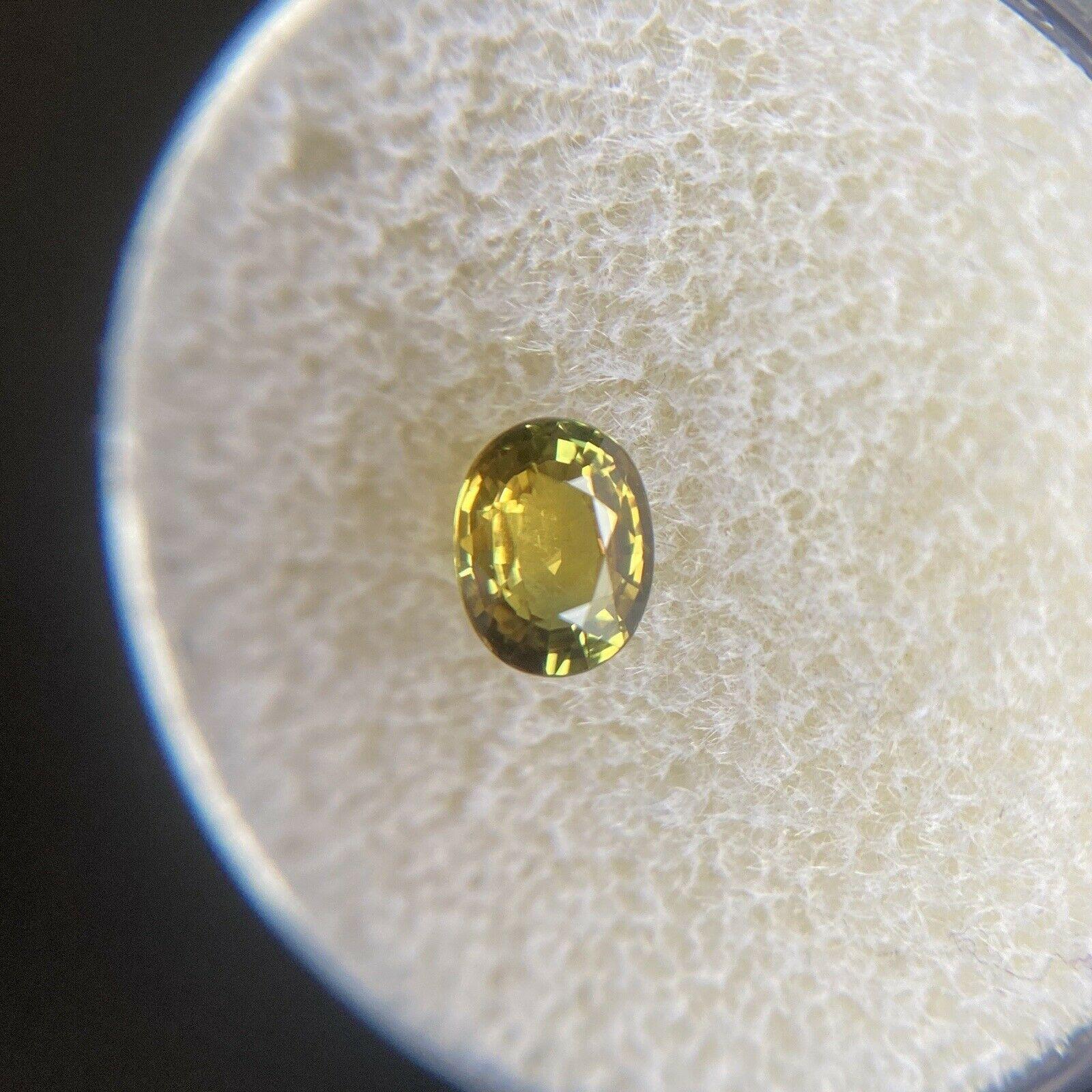 Vivid Green Yellow Untreated Sapphire 0.68ct Oval Cut Untreated Gem 2