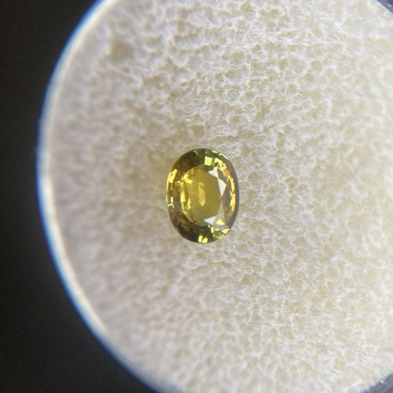 Vivid Green Yellow Untreated Sapphire 0.68ct Oval Cut Untreated Gem 4