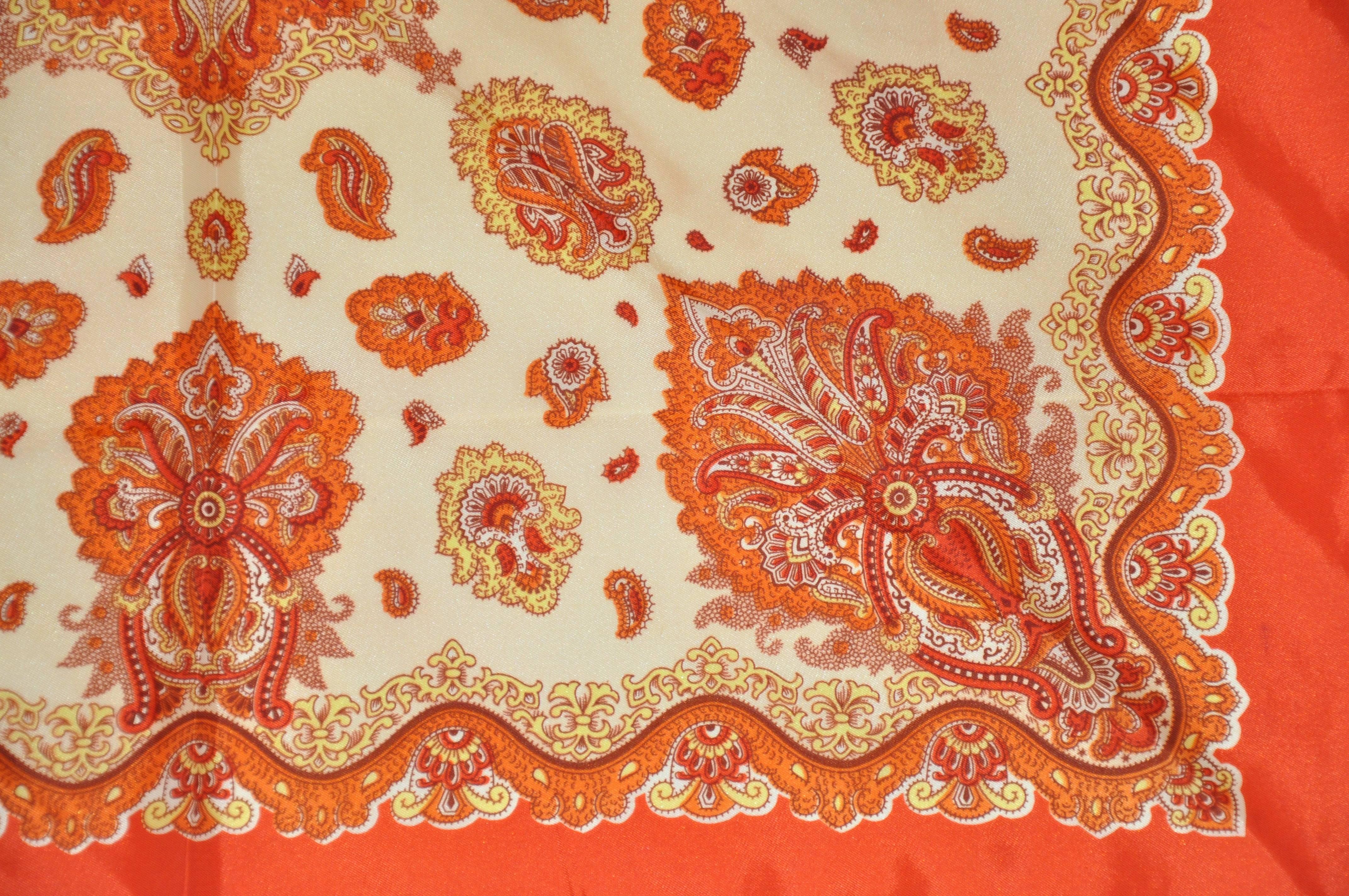       This wonderfully vivid scarf with multi shades of tangerines and orange hue set in multi-palseys measures 26 inches by 26 inches and finished with hand-rolled edges. Made of acetate in Japan.