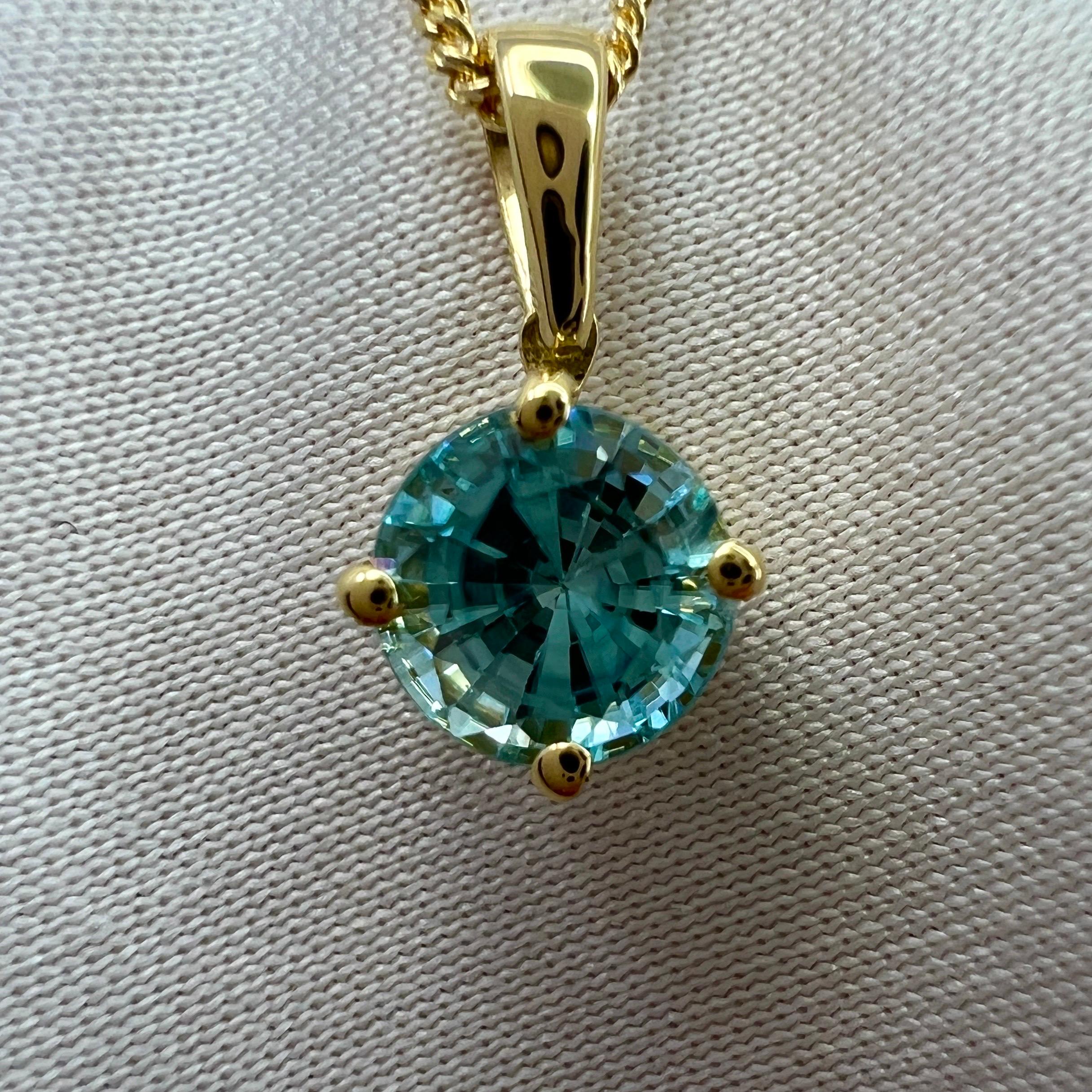 Vivid Neon Blue Zircon 1.20 Carat Round Cut 18k Yellow Gold Pendant Necklace For Sale 1