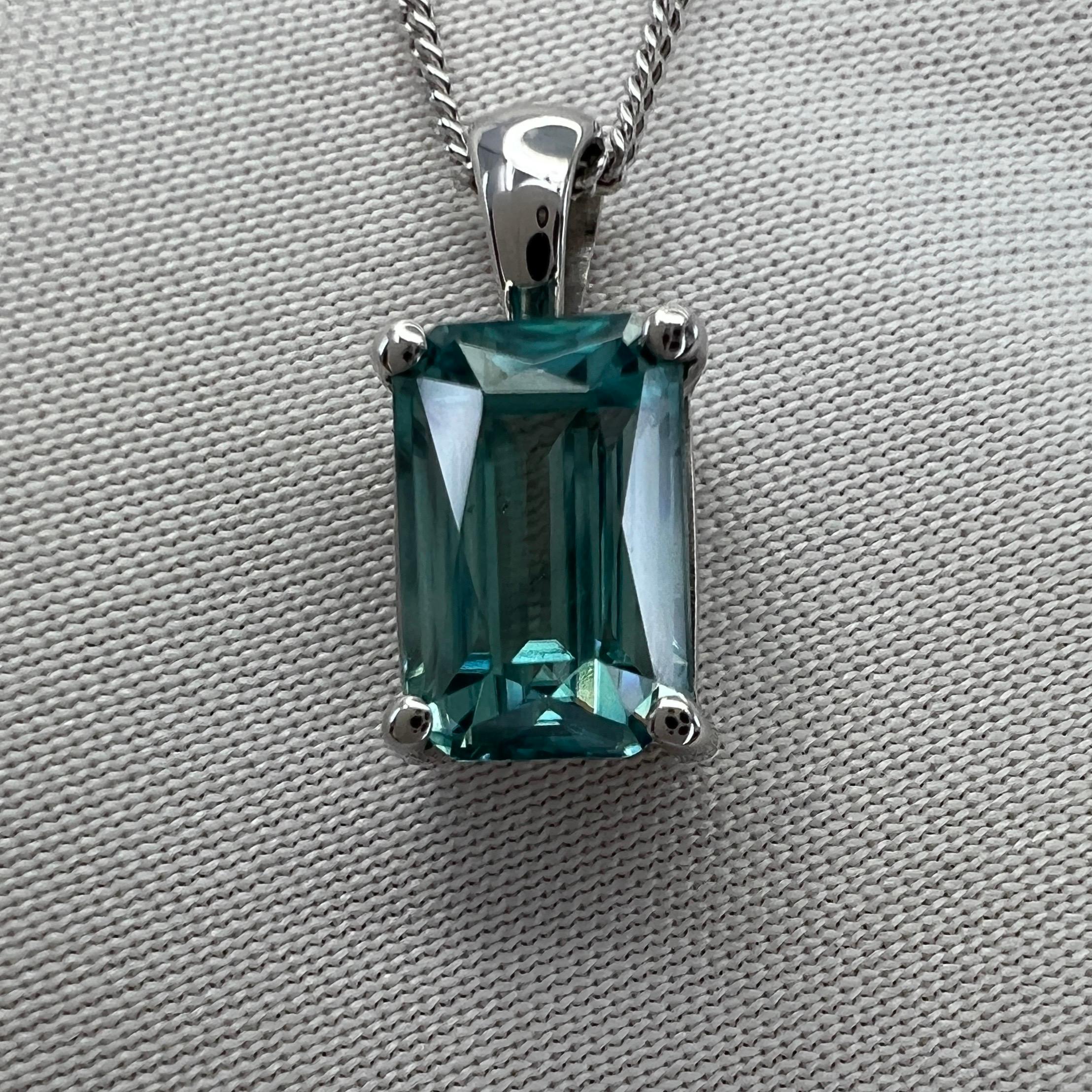 Natural Blue Zircon Fancy Emerald/Octagonal Cut 18k White Gold Pendant Necklace.

Beautiful natural 2.41 carat blue zircon set in a fine 18k white gold solitaire pendant. Stunning blue zircon with a vivid neon blue colour and excellent clarity, very