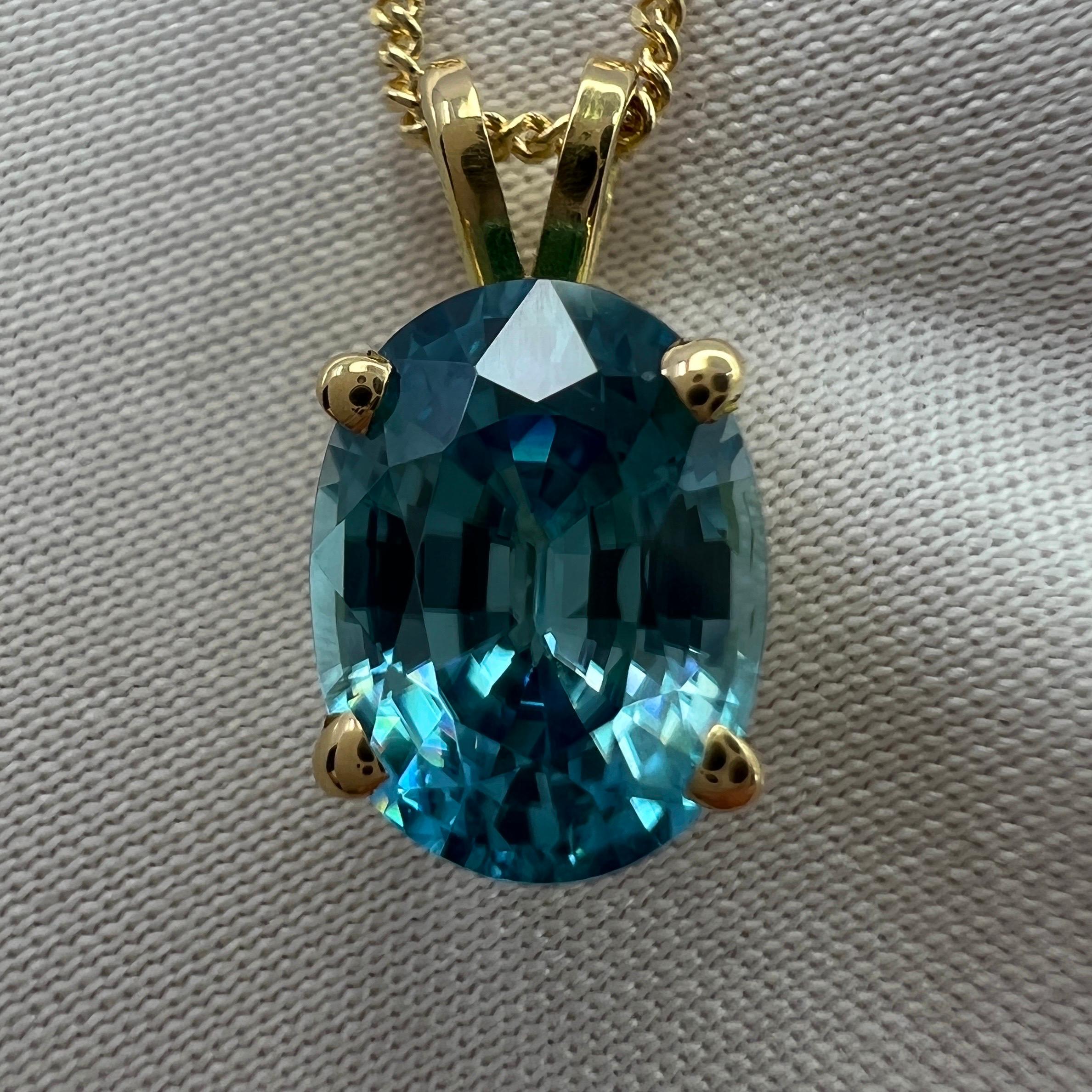 Vivid Neon Blue Natural Zircon Oval Cut 18k Yellow Gold Pendant Necklace.

Beautiful natural 3.10 carat blue zircon set in a fine 18k yellow gold solitaire pendant. Stunning blue zircon with a vivid neon blue colour and excellent clarity, very clean