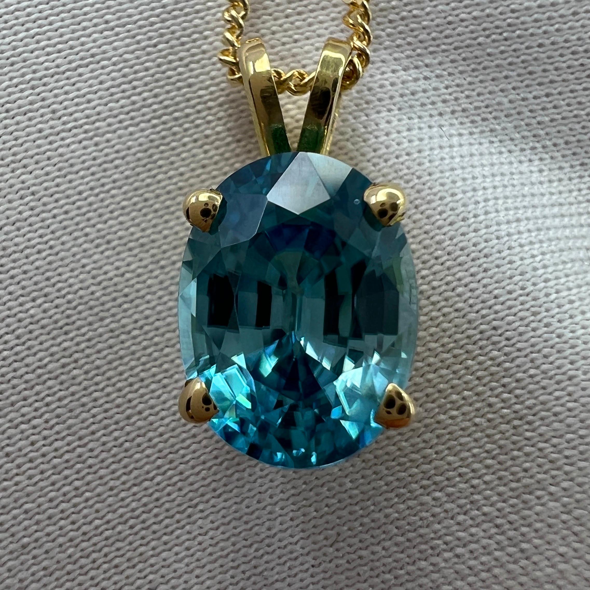 Vivid Neon Blue Zircon 3.10 Carat Oval Cut 18k Yellow Gold Pendant Necklace In New Condition For Sale In Birmingham, GB