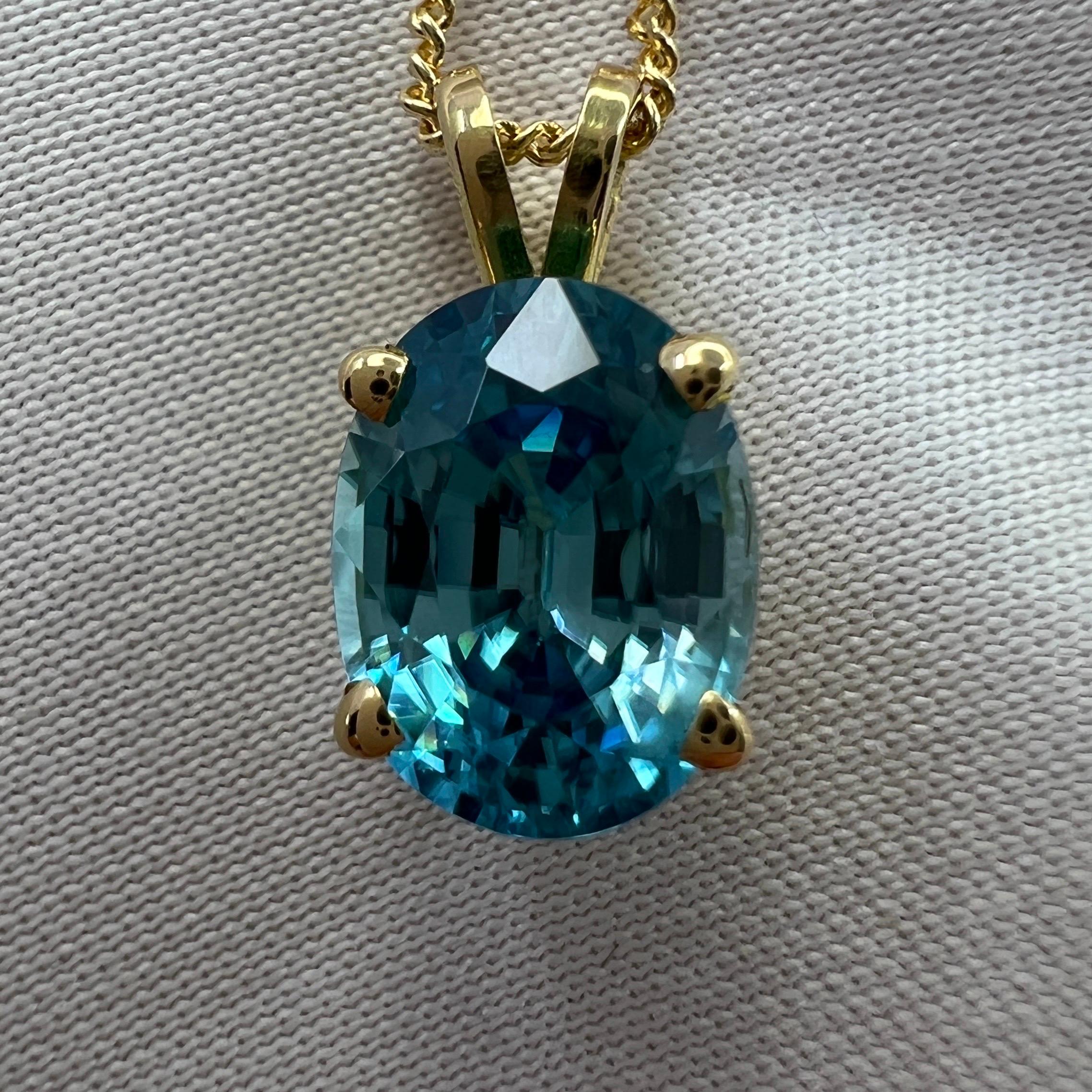 Women's or Men's Vivid Neon Blue Zircon 3.10 Carat Oval Cut 18k Yellow Gold Pendant Necklace For Sale