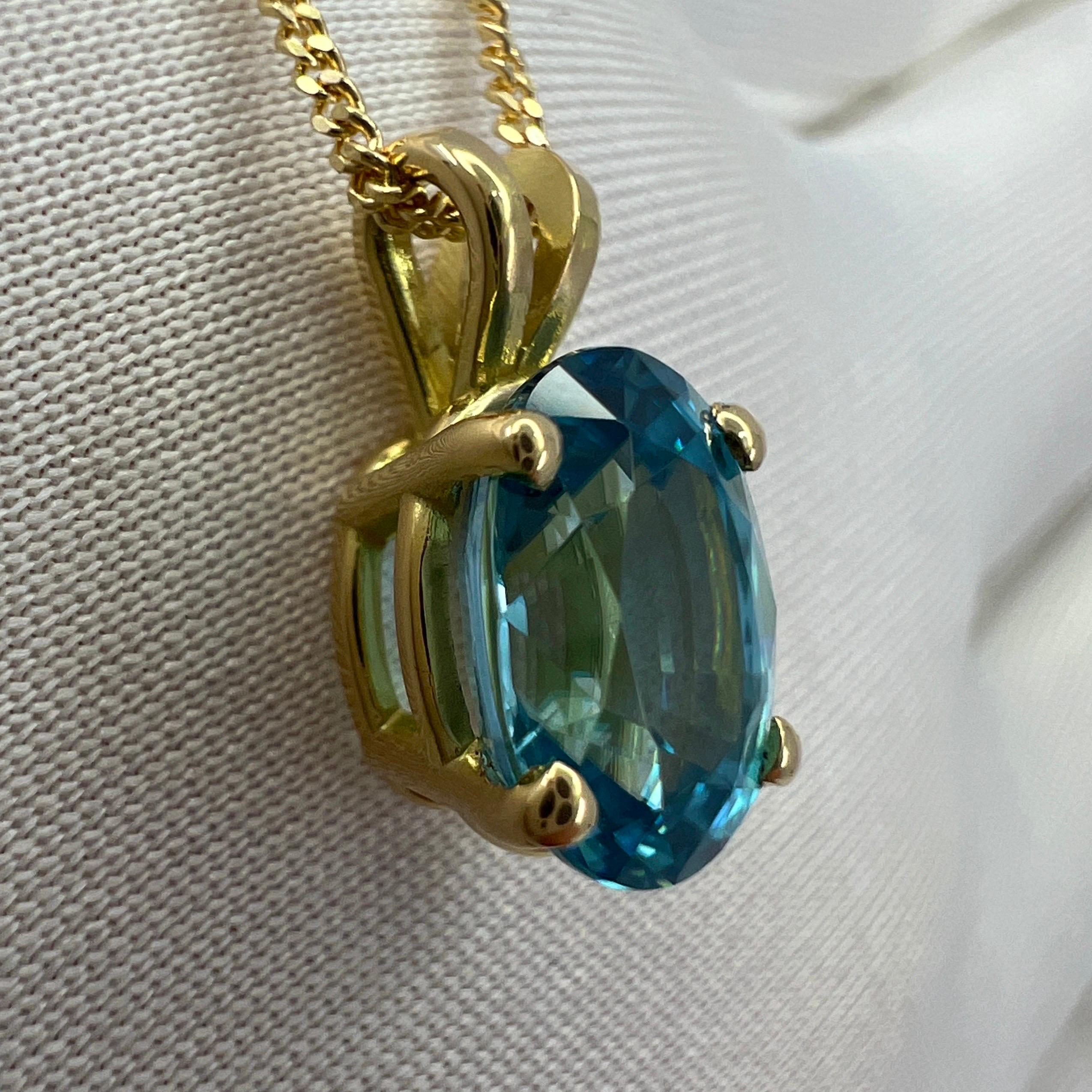 Vivid Neon Blue Zircon 3.10 Carat Oval Cut 18k Yellow Gold Pendant Necklace For Sale 1