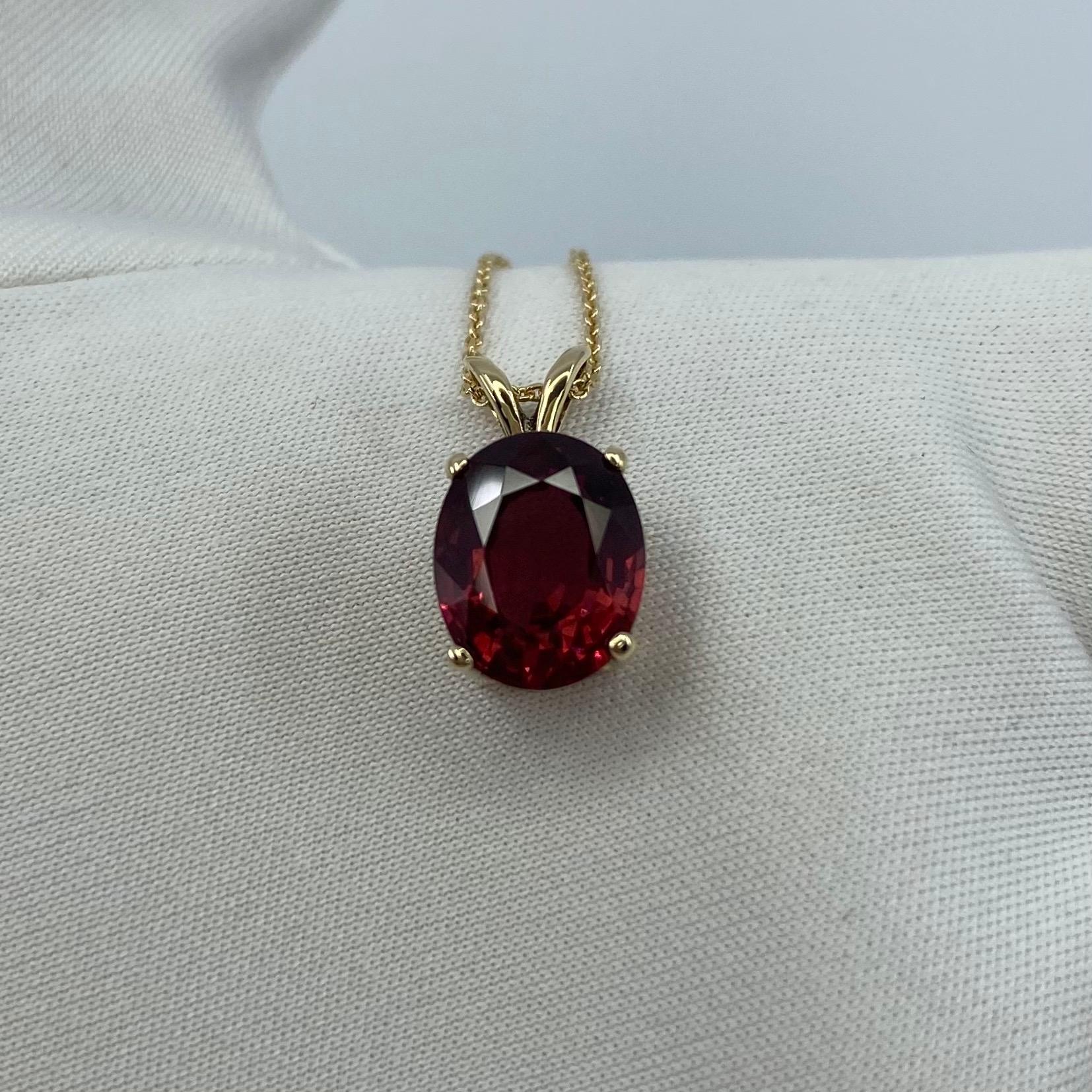 Vivid Orangey Pink Red Garnet Solitaire Pendant.
Beautiful and unique colour 3.30 carat garnet in a fine 14k yellow gold solitaire pendant. This gem has a stunning colour and excellent clarity. A very clean stone.
It also has an excellent oval cut