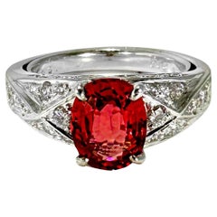 Vivid Oval Shaped Orangy-Red Burmese Spinel set in Platinum Ring with Diamonds