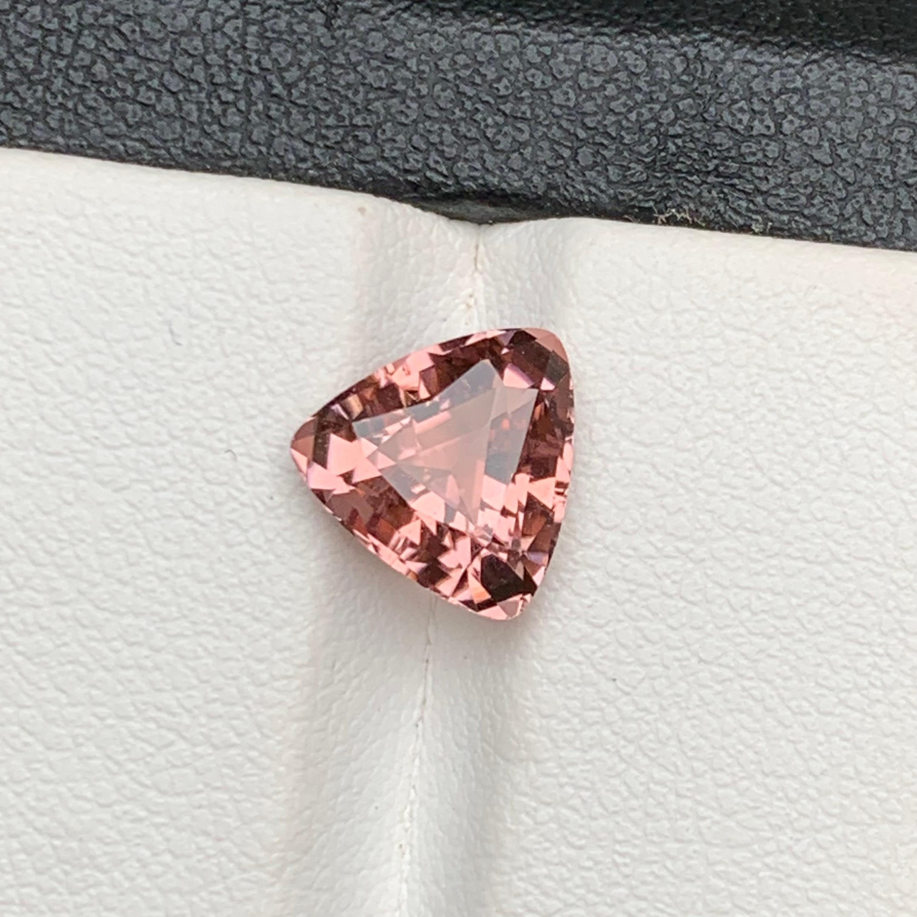 Peach Color  Natural Tourmaline Loose Gemstone for Ring in a Trillion Cut from Afghanistan!!

💎 GEMSTONE TYPE: Tourmaline
⚖️ WEIGHT: 2.70 Carats
🪚 SHAPE & CUT: Trillion Cut
📏 SIZE (MM): 9.19 x 9.34 x 5.33
🌈 COLOR:  Peach
🔎 CLARITY: Loupe