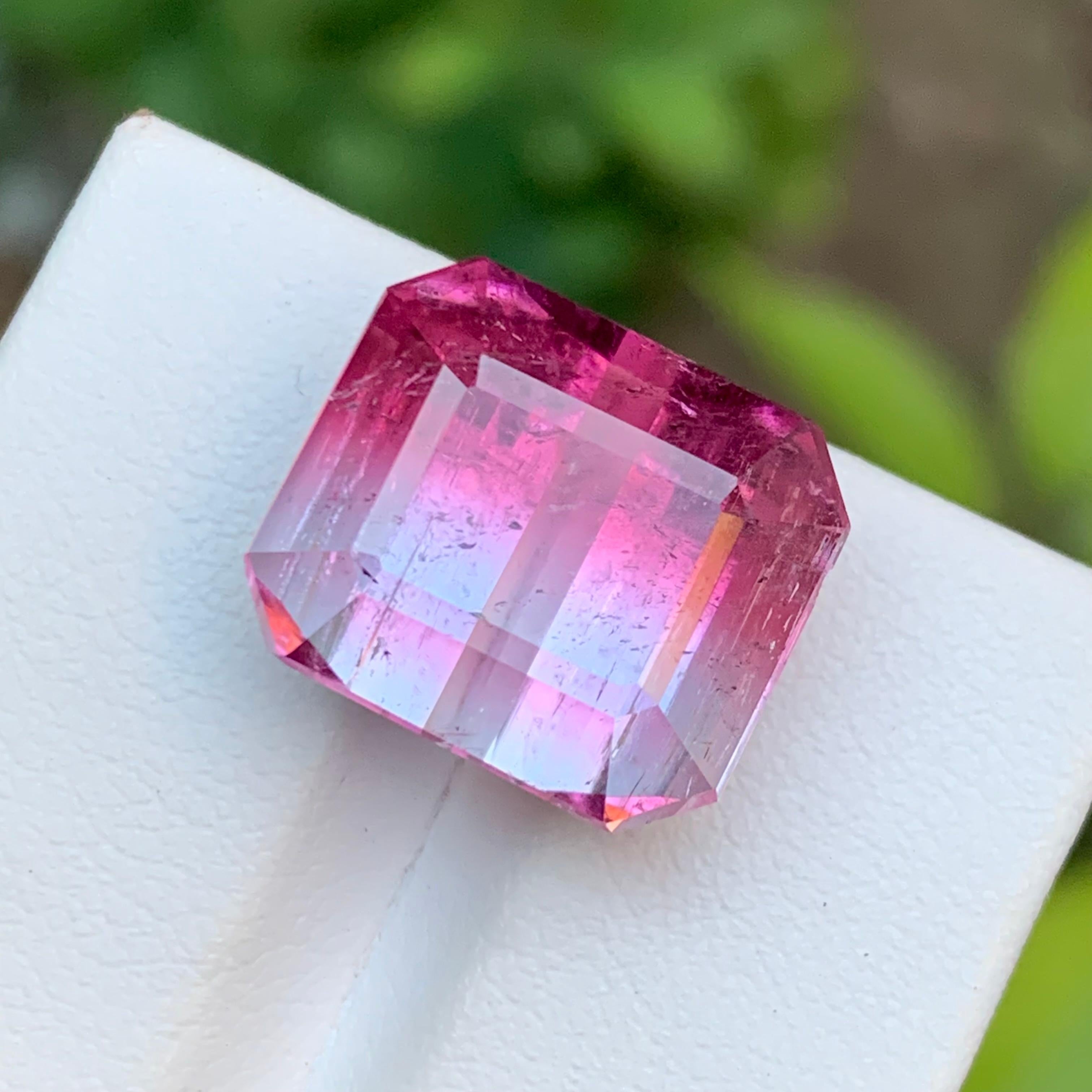 Vivid Rich Pink Bicolor Natural Tourmaline Loose Gemstone in a beautiful Emerald Cut design from Kunar, Afghanistan!!

💎 GEMSTONE TYPE: Tourmaline
⚖️ WEIGHT: 16.95 Carats
🪚 SHAPE & CUT: Emerald Cut
📏 SIZE (MM): 13.12 x 15.08 x 10.64
🌈 COLOR: