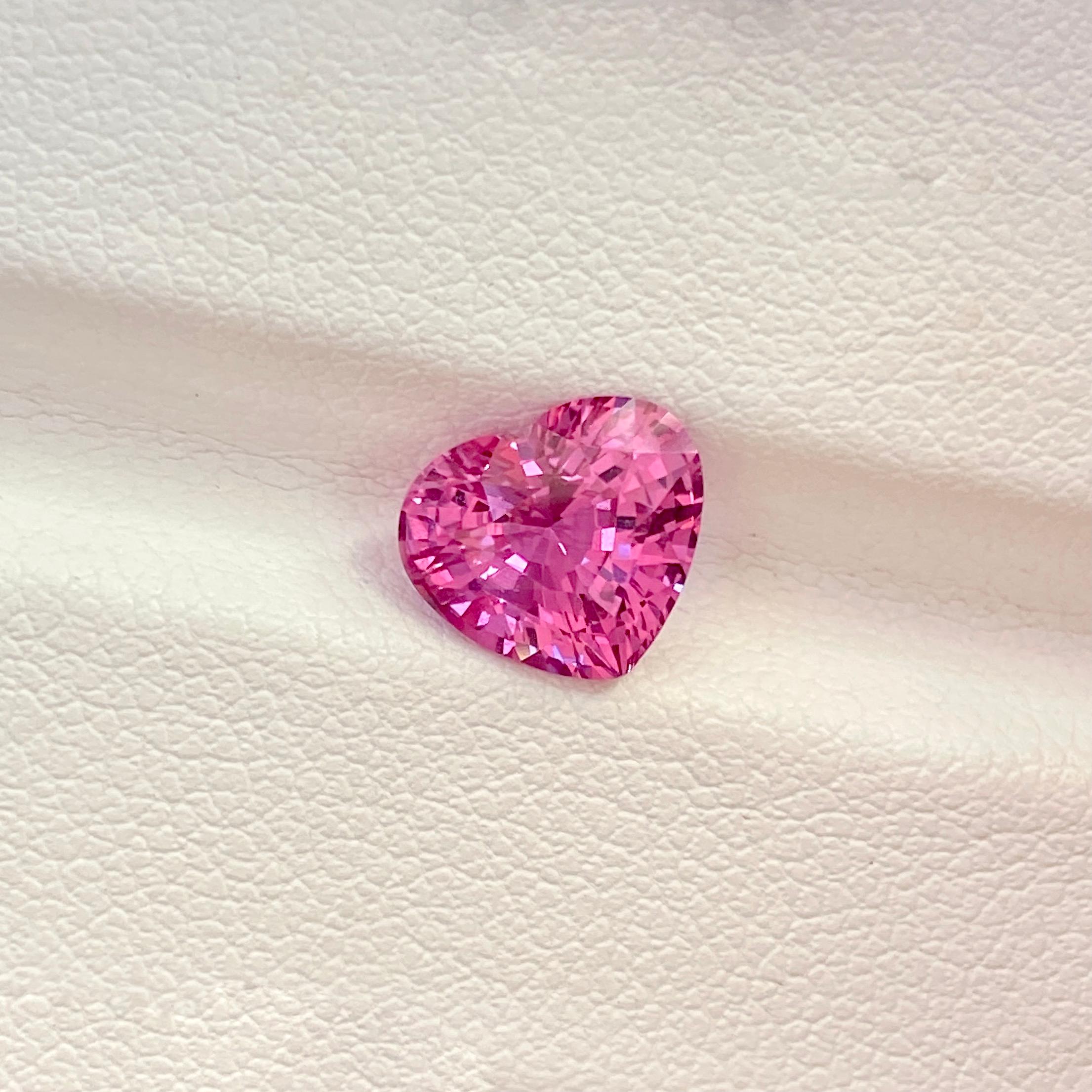 Your heart will skip a beat with this over 2.5 carat heart shaped vivid pink sapphire beauty. A natural sapphire with impossibly vibrant saturated reddish pink colour with high clarity endless sparkle ideal for a bespoke jewellery piece.

This vivid