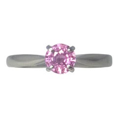 Vivid Purple Pink Unheated Sapphire Platinum Solitaire Ring 0.65 Carat Round Cut