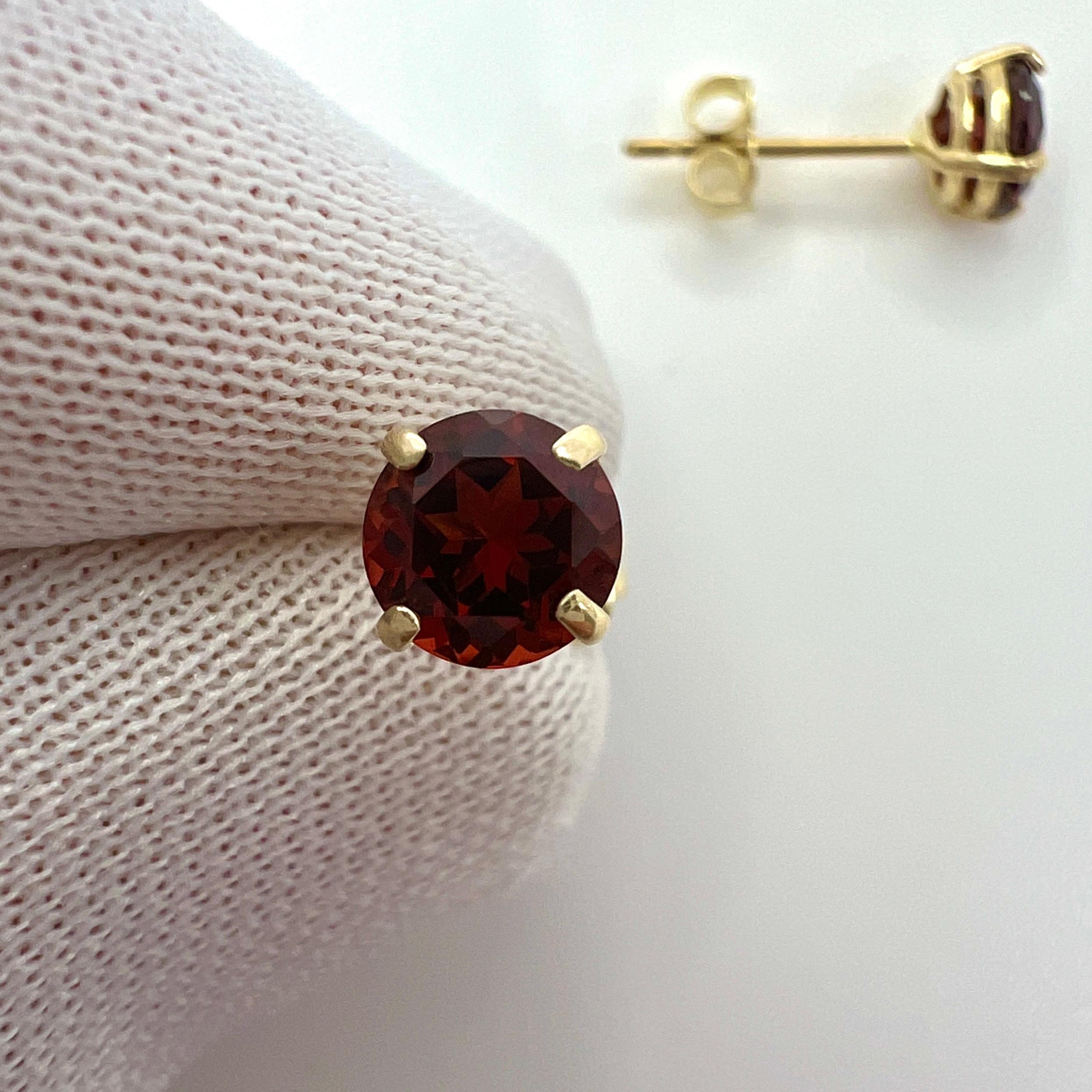 Vivid Red 1.20 Carat Almandine Rhodolite Garnet 9k Yellow Gold Earring Studs.

Beautiful 5mm matching pair of round garnets with vivid red colour, excellent clarity and an excellent round brilliant cut.

The gemstones may vary slightly from the