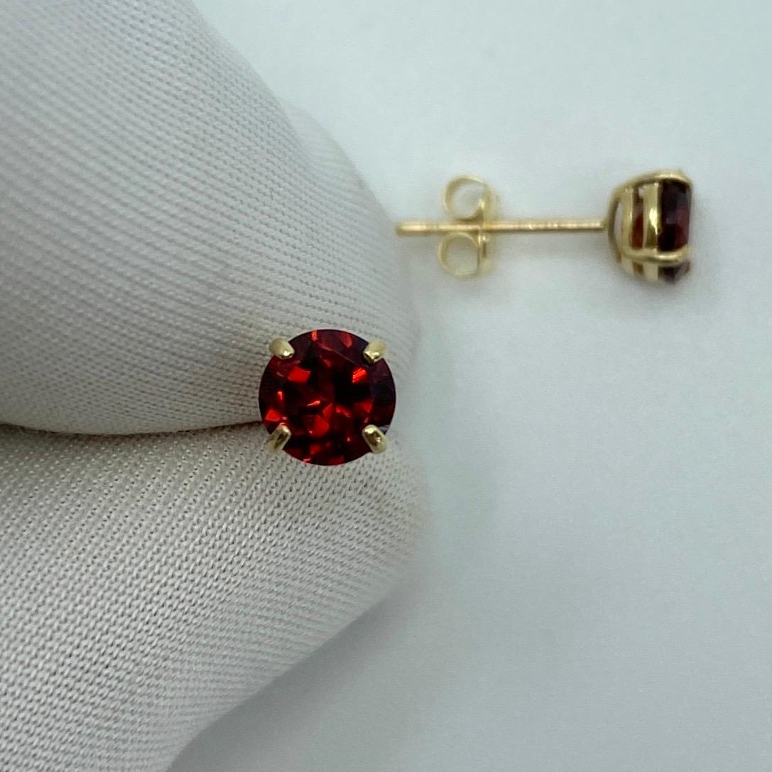 Vivid Red 1.20 Carat Almandine Rhodolite Garnet Yellow Gold Earring Studs.

Beautiful 5mm matching pair of round garnets with vivid red colour, excellent clarity and an excellent round brilliant cut.

Set in lightweight 9k yellow gold studs with