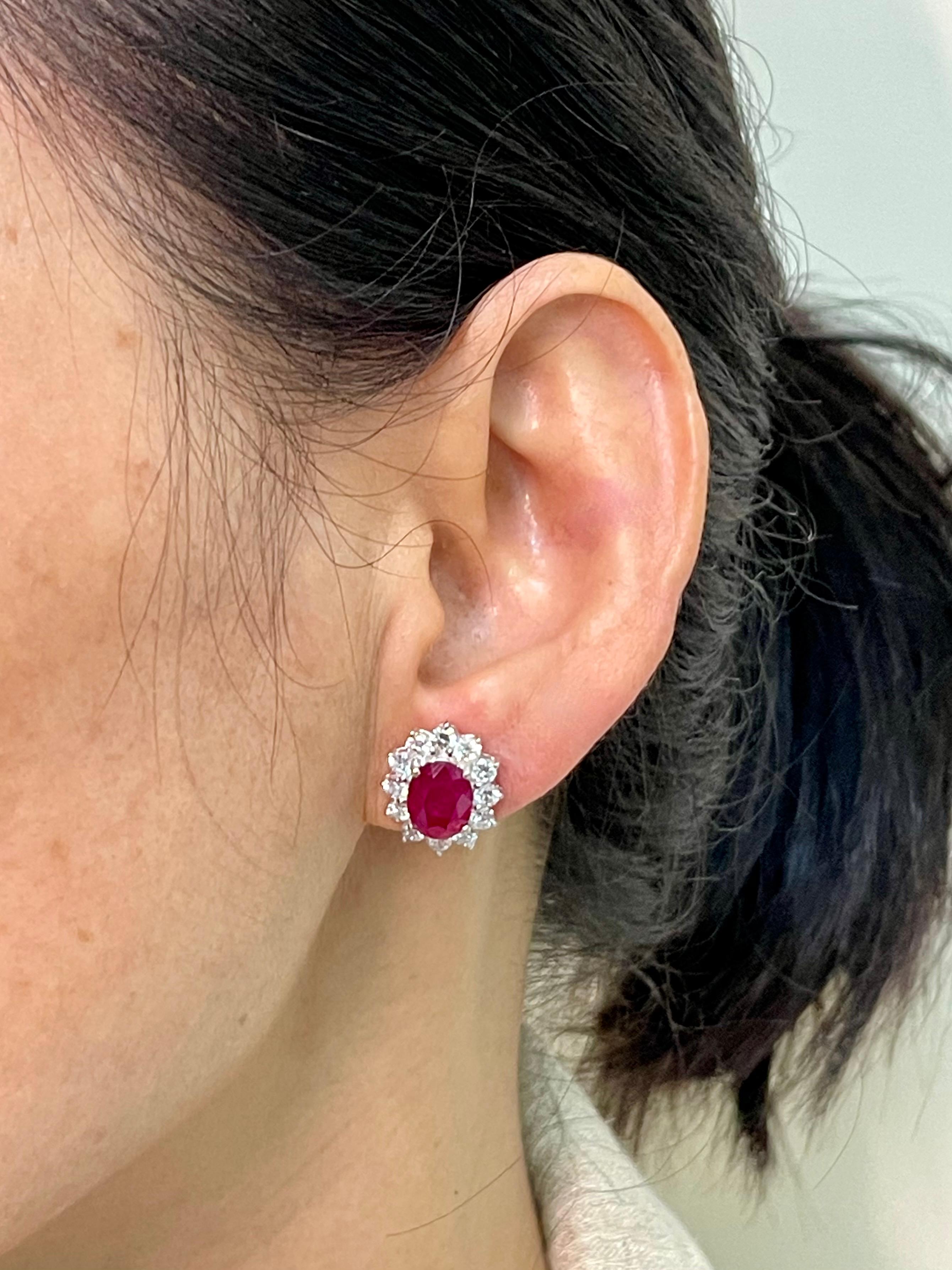 Please check out the HD video. These earrings GLOW! Here is a fantastic vivid red Ruby diamond stud earrings. This pair of ruby diamond stud earrings are absolutely beautiful and simple. The earrings are set in 18k white gold. It contains an