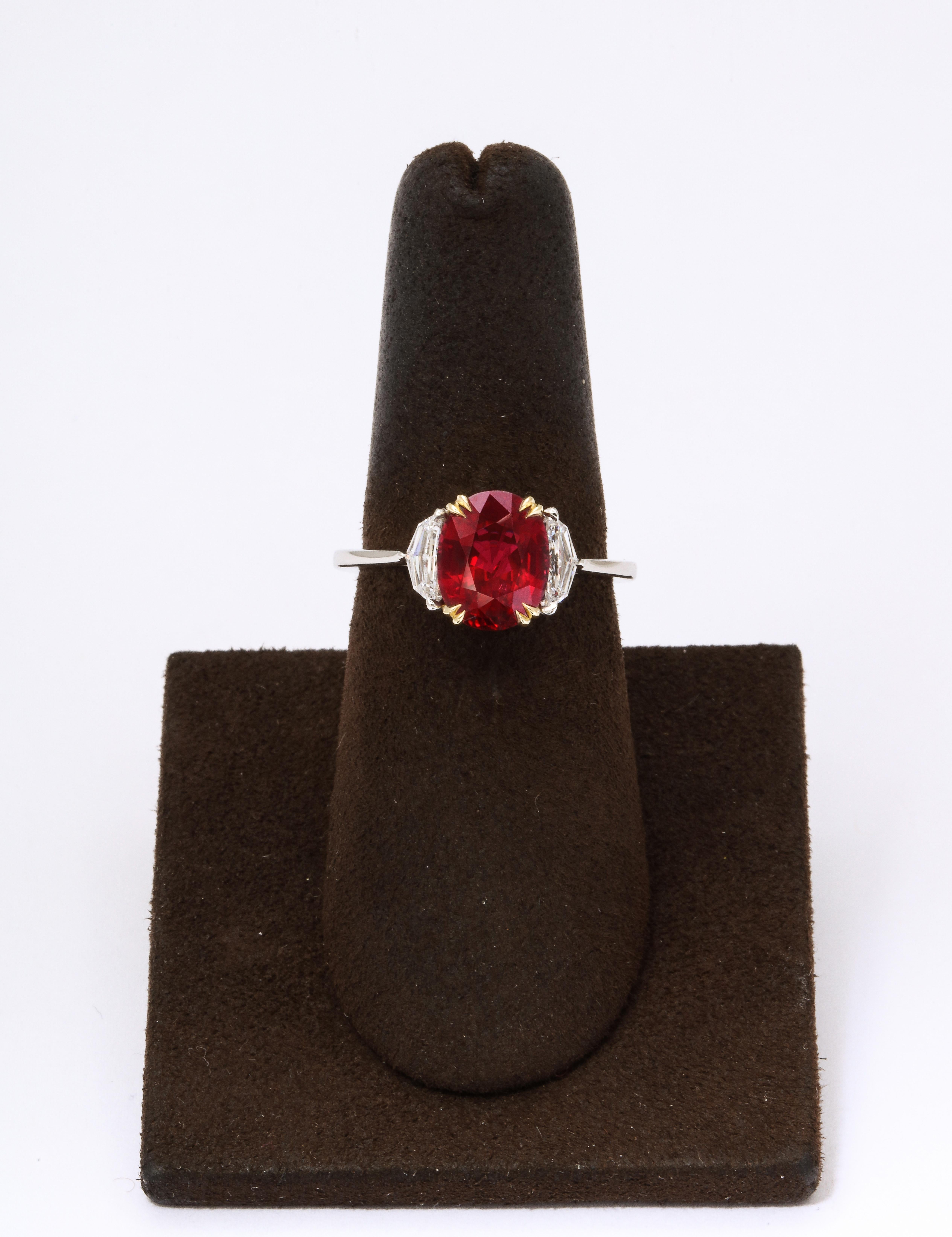 
A SPECTACULAR Ruby!

Certified “Vivid Red” 3.10 carat Ruby. 

.34 carats of colorless side diamonds. 

Set in a custom platinum and 18k yellow gold mounting. 

Currently a size 6.5, this ring can be sized to any finger size 

Certified by C