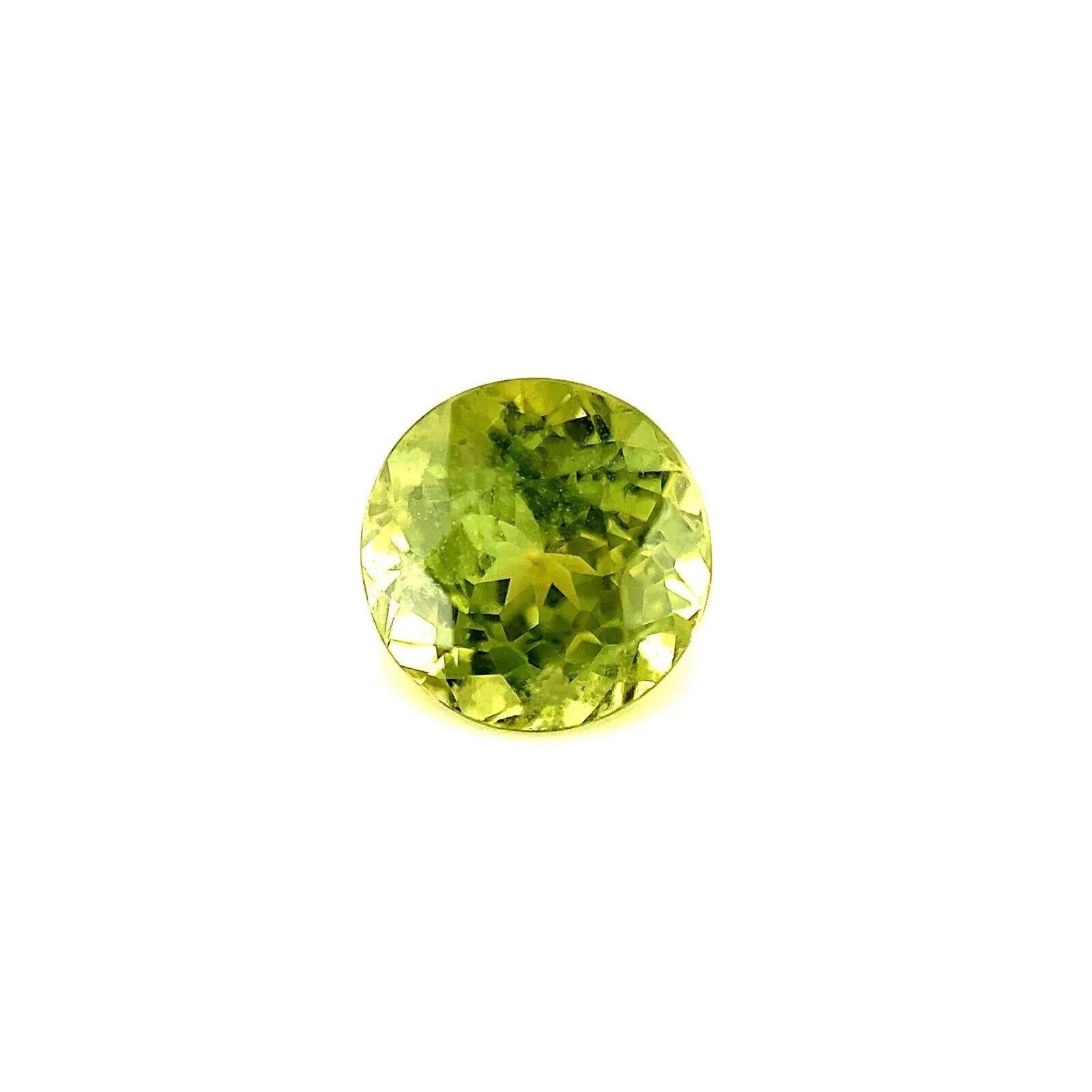 Vivid Yellow Green Sapphire 1.58ct Round Brilliant Cut Loose Gemstone 6.5mm

Natural Yellow Green Round Cut Sapphire.
1.58 Carat with a bright yellow green colour. Also has good clarity, a clean stone with only some small natural inclusions