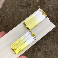Vivid Yellow with Colourless Bicolor Emerald Cut Quartz Gemstone Pair