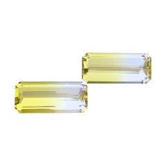 Vivid Yellow with Colourless Bicolor Emerald Cut Quartz Gemstone Pair