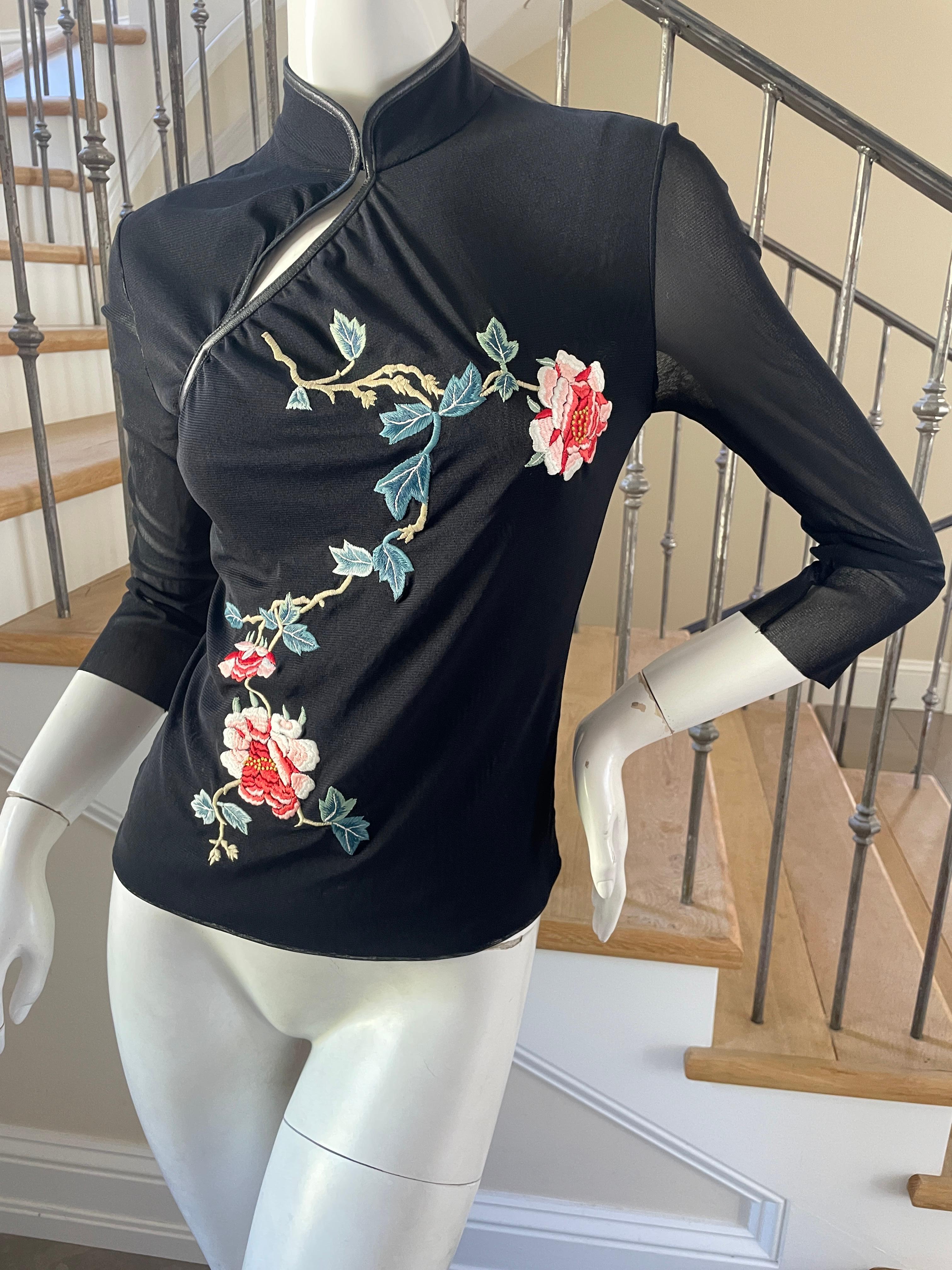 Vivienne Tam Vintage Cheongsam Style Black Top with Embroidered Flowers
This is such a charming piece.
Size 1
Bust 32