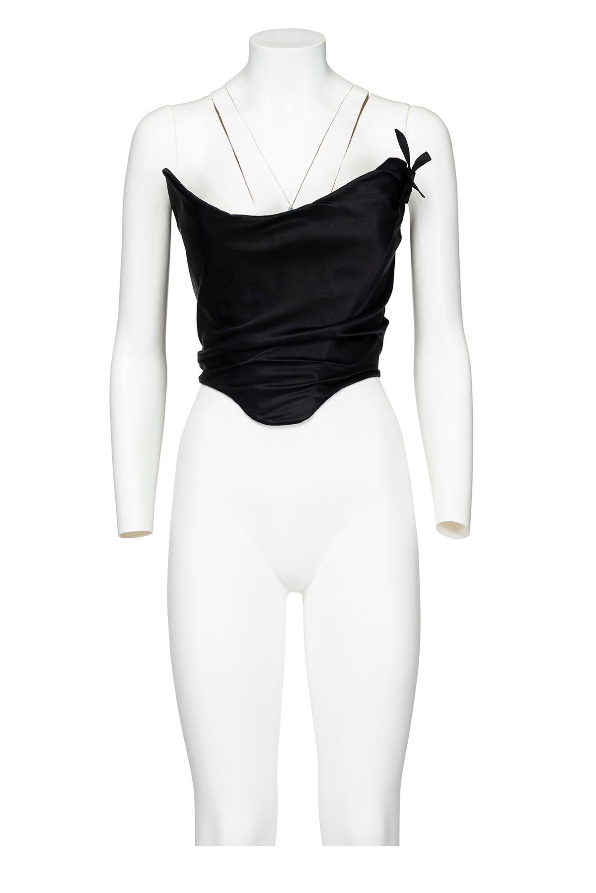 00's iconic draped satin corset by Vivienne Westwood.
Zipper and button closure on the back.
The composition is 81% polyamide and 19% elastane.