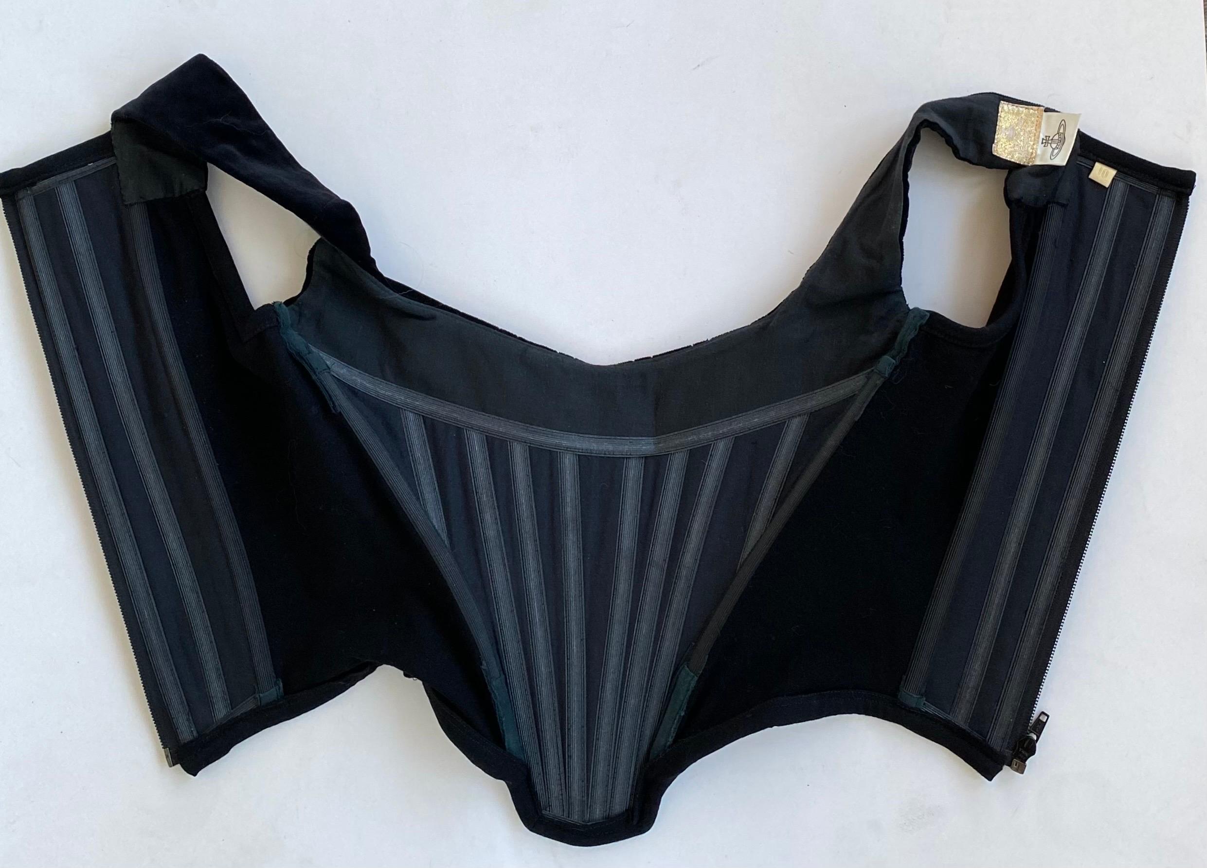 Iconic 1990s Vivienne Westwood Corset 
100% Cotton velvet lined with 100% acetate
Zipper up the back 
Gold label
Size 10 
Excellent condition with some very faint whitish marks near the armscye interior on one side that won’t show when worn