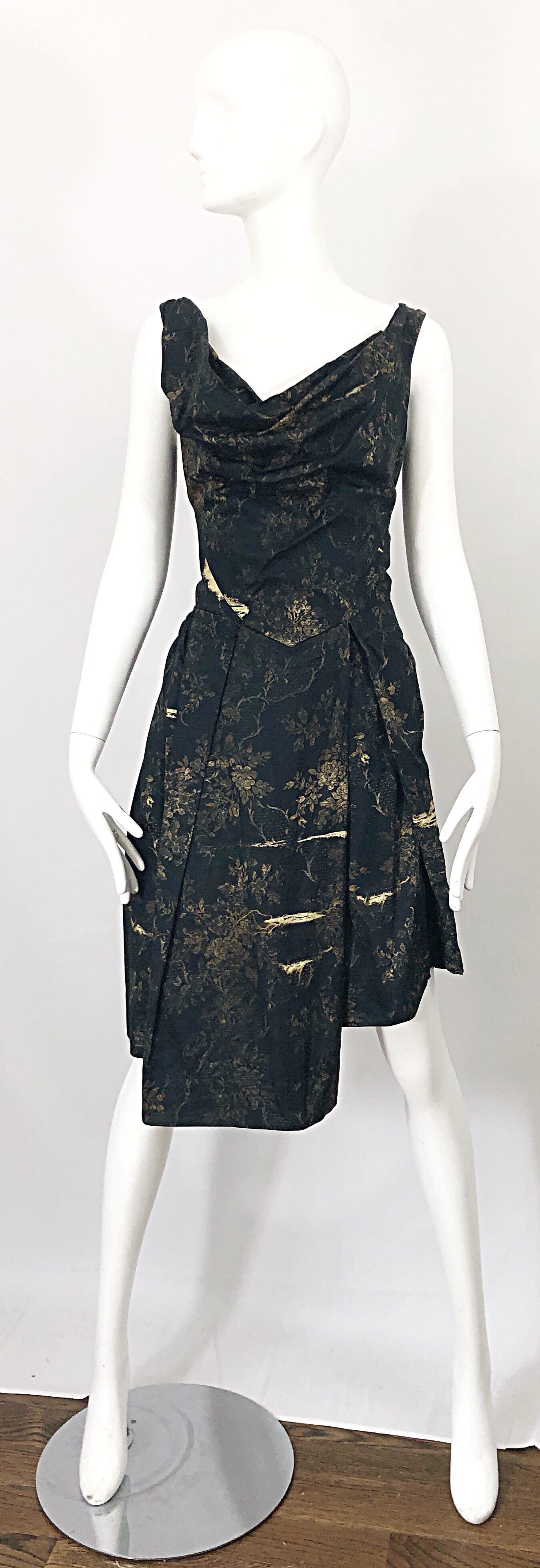 Avant Garde early 2000s  VIVENNE WESTWOOD black and brown flower print asymmetrical dress! Features Westwood's signature draped bodice. Hi-Lo skirt. Hidden zipper up the back with hook-and-eye closure. POCKET at one side of the hip.
 Can also be