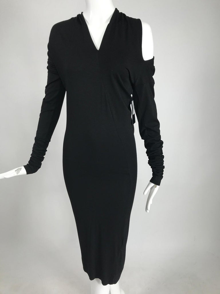 Vivienne Westwood Anglomania black Timans asymmetric jersey dress, new with tags. Sleek black jersey dress with double V neckline and open shoulders. X long sleeves and tight fit dress. Unlined. Pull on without fastenings. Marked size X-small. Never