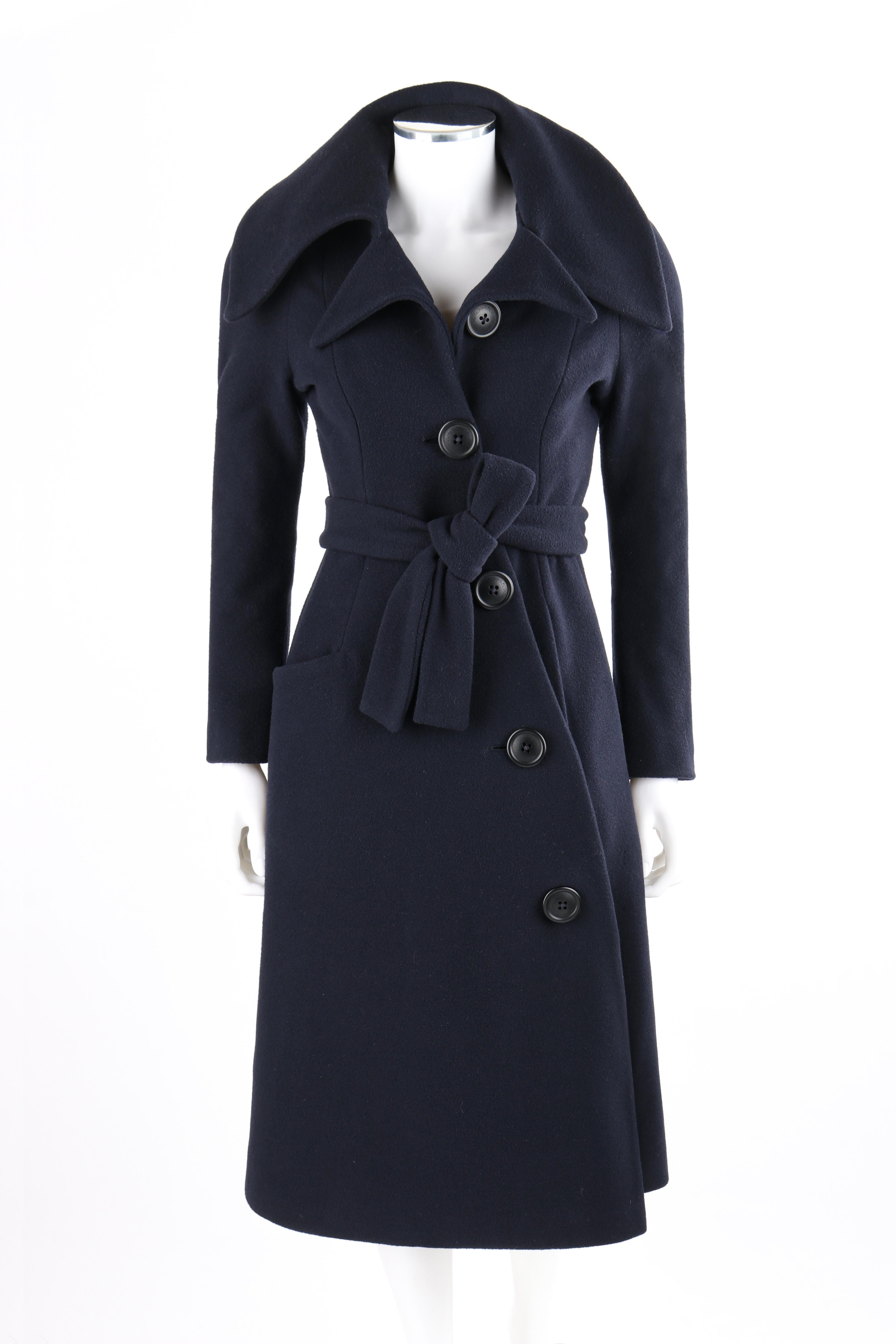VIVIENNE WESTWOOD “Anglomania” Navy Blue Asymmetric Button Up Belted Coat Jacket

Brand / Manufacturer: Vivienne Westwood
Designer: Vivienne Westwood
Style: Belted coat
Color(s): Blue
Lined: Yes
Marked Fabric Content: “80% Virgin wool, 20% nylon”