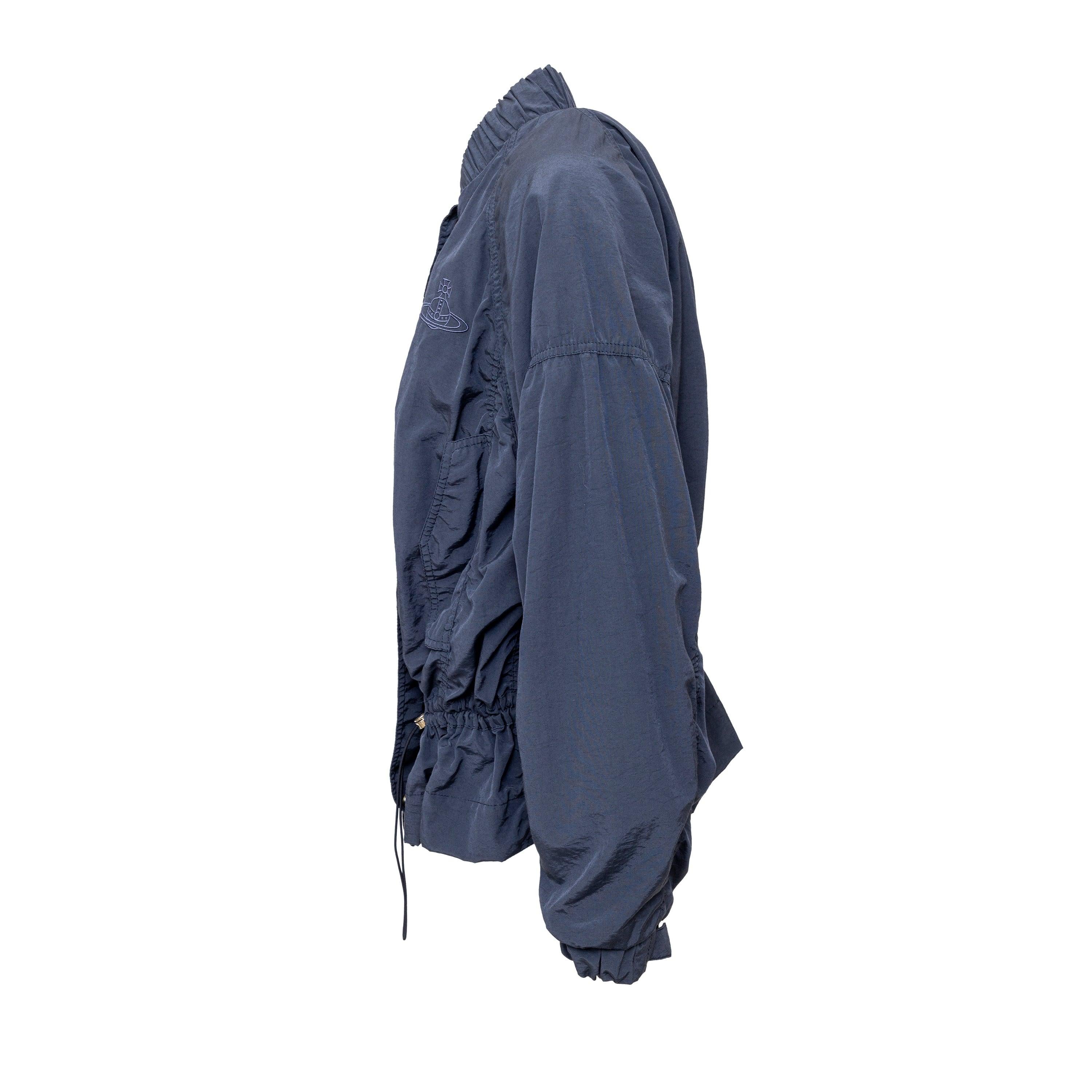 Made with a durable nylon and cotton blend, this Vivienne Westwood jacket is perfect for windy or rainy days. The drawstring at the lower waist and hidden zipper provide a comfortable fit, while the brand's iconic orb embroidery adds a touch of