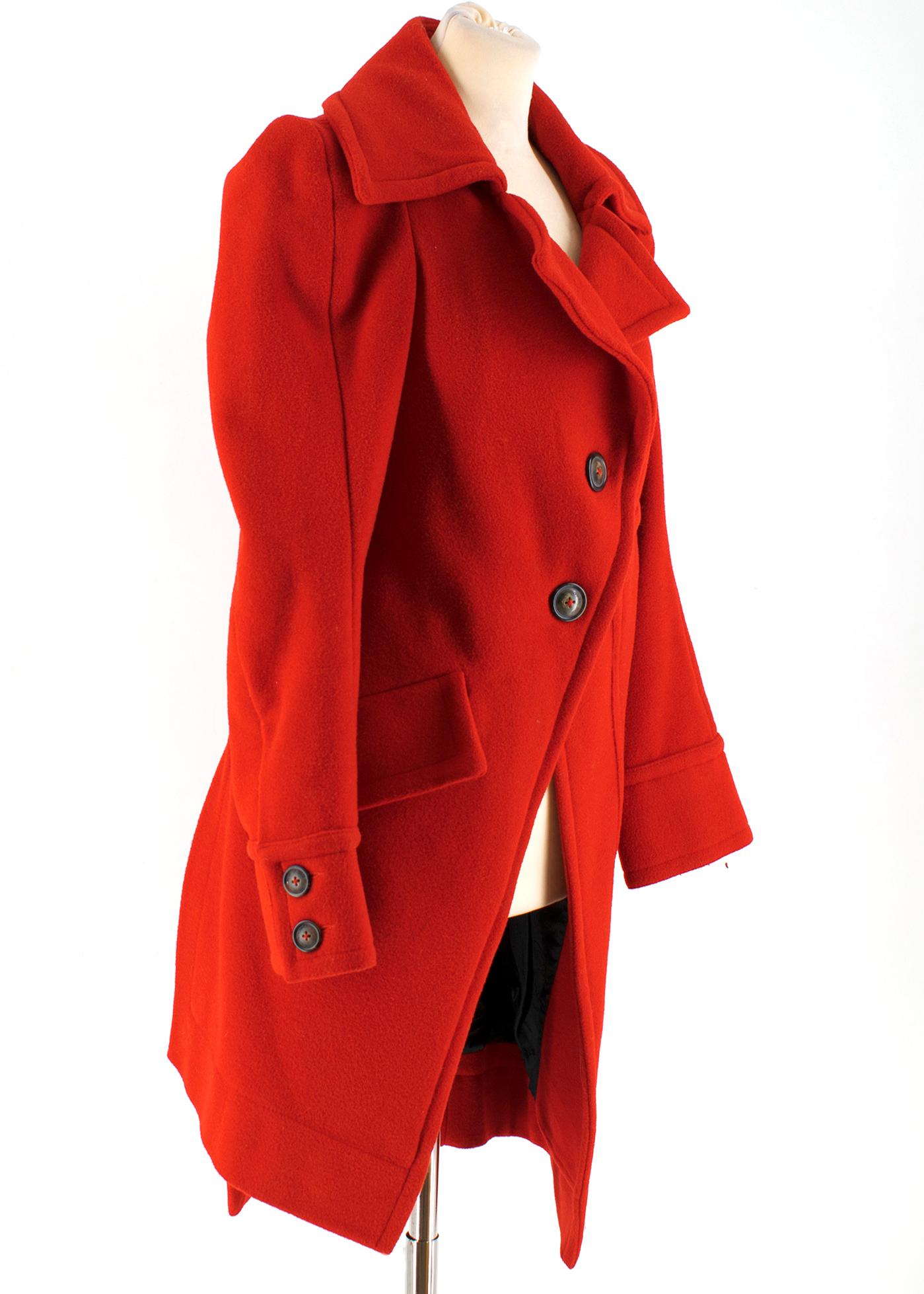 Vivienne Westwood Anglomania Red Wool Asymmetric Coat

Soft, wool coat in deep red,
Long sleeves,
Front button fastenings,
1 front flap pocket,
1 front slant pocket,
Side vent,
Mid-weight

Please note, these items are pre-owned and may show some