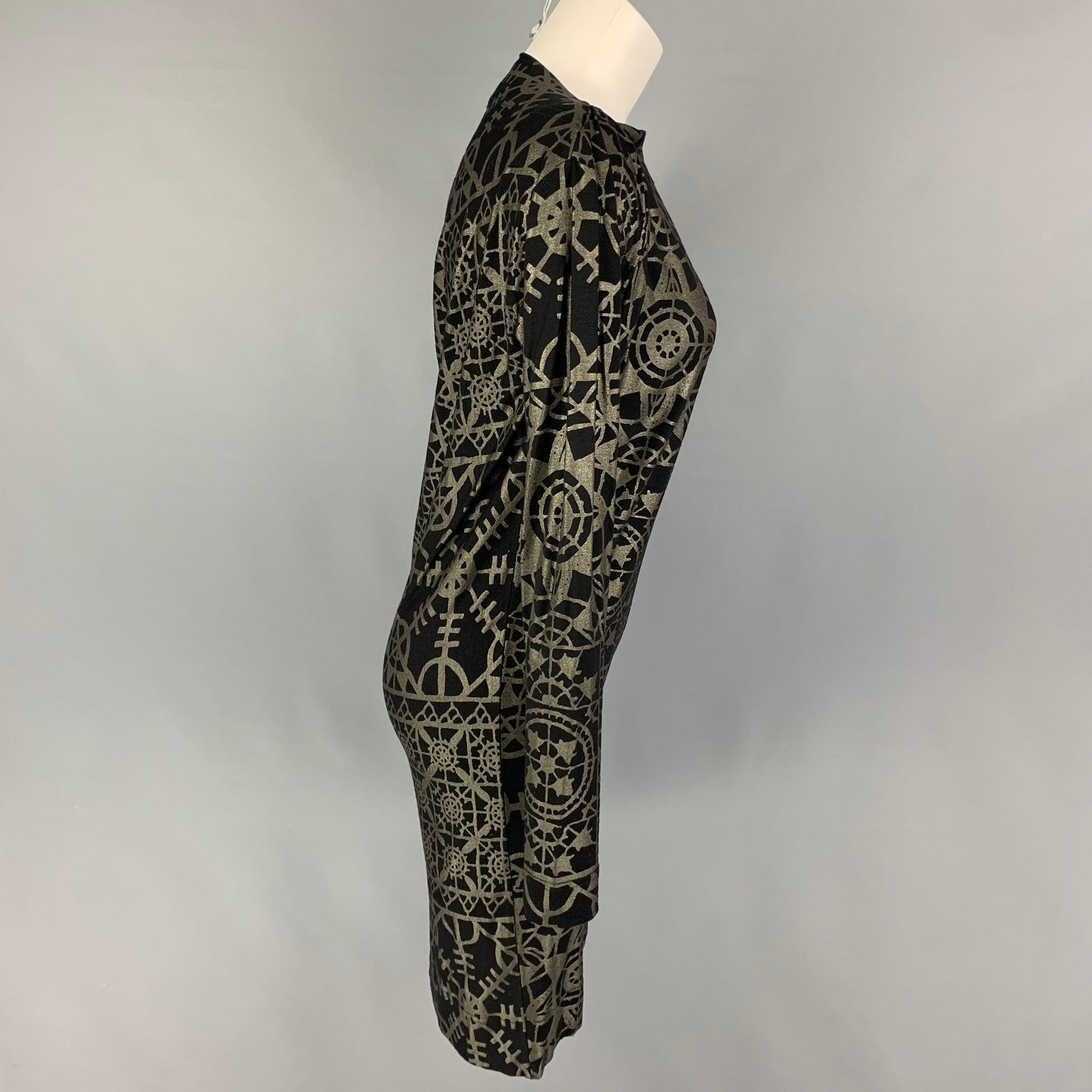 VIVIENNE WESTWOOD ANGLOMANIA dress comes in a black & silver abstract viscose blend featuring a ruched side detail, long sleeves, and a mock neckline.
Very Good
Pre-Owned Condition. 

Marked:   S 

Measurements: 
 
Shoulder: 18 inches  Bust: 34