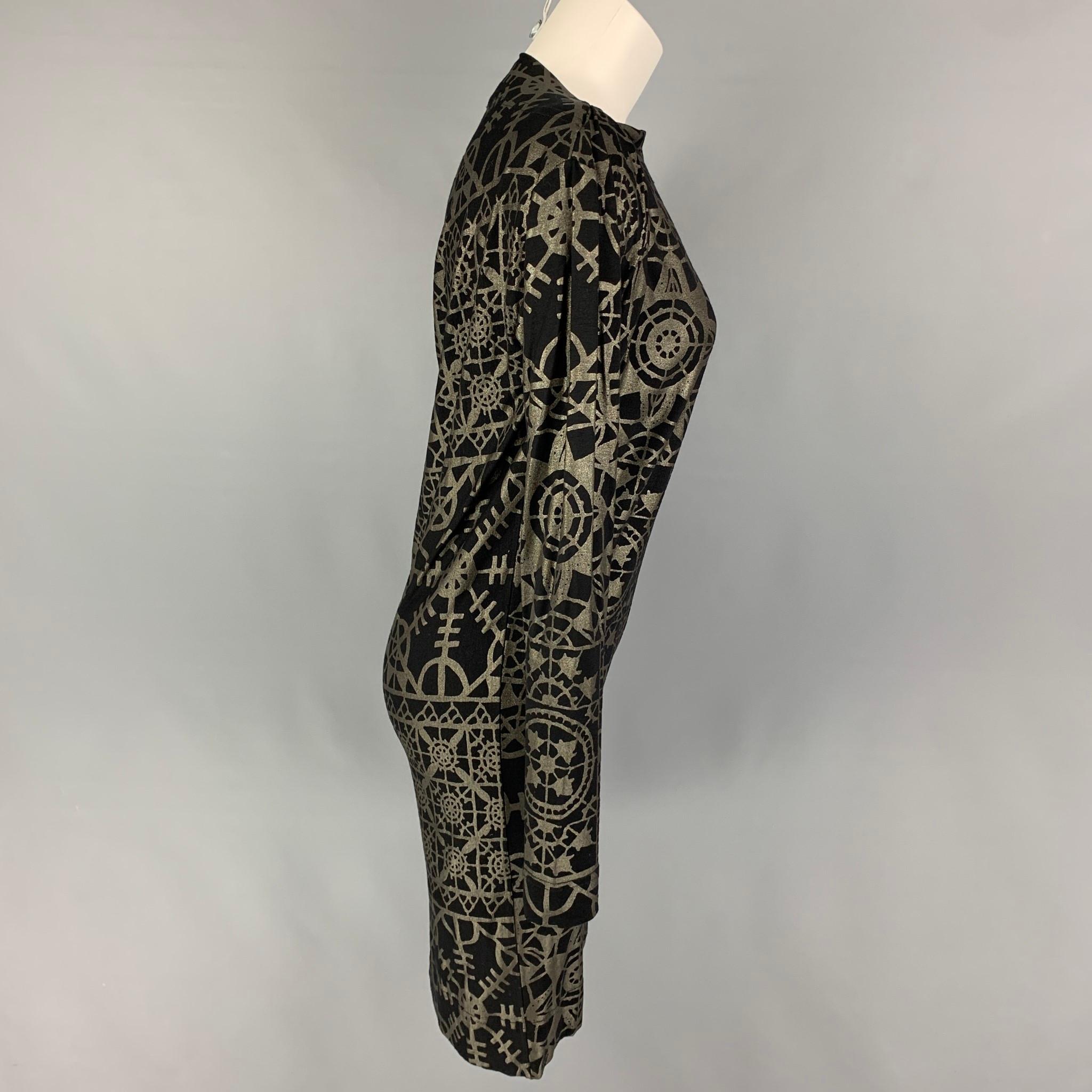 VIVIENNE WESTWOOD ANGLOMANIA dress comes in a black & silver abstract viscose blend featuring a ruched side detail, long sleeves, and a mock neckline. 

Very Good Pre-Owned Condition.
Marked: S

Measurements:

Shoulder: 18 in.
Bust: 34 in.
Hip: 30