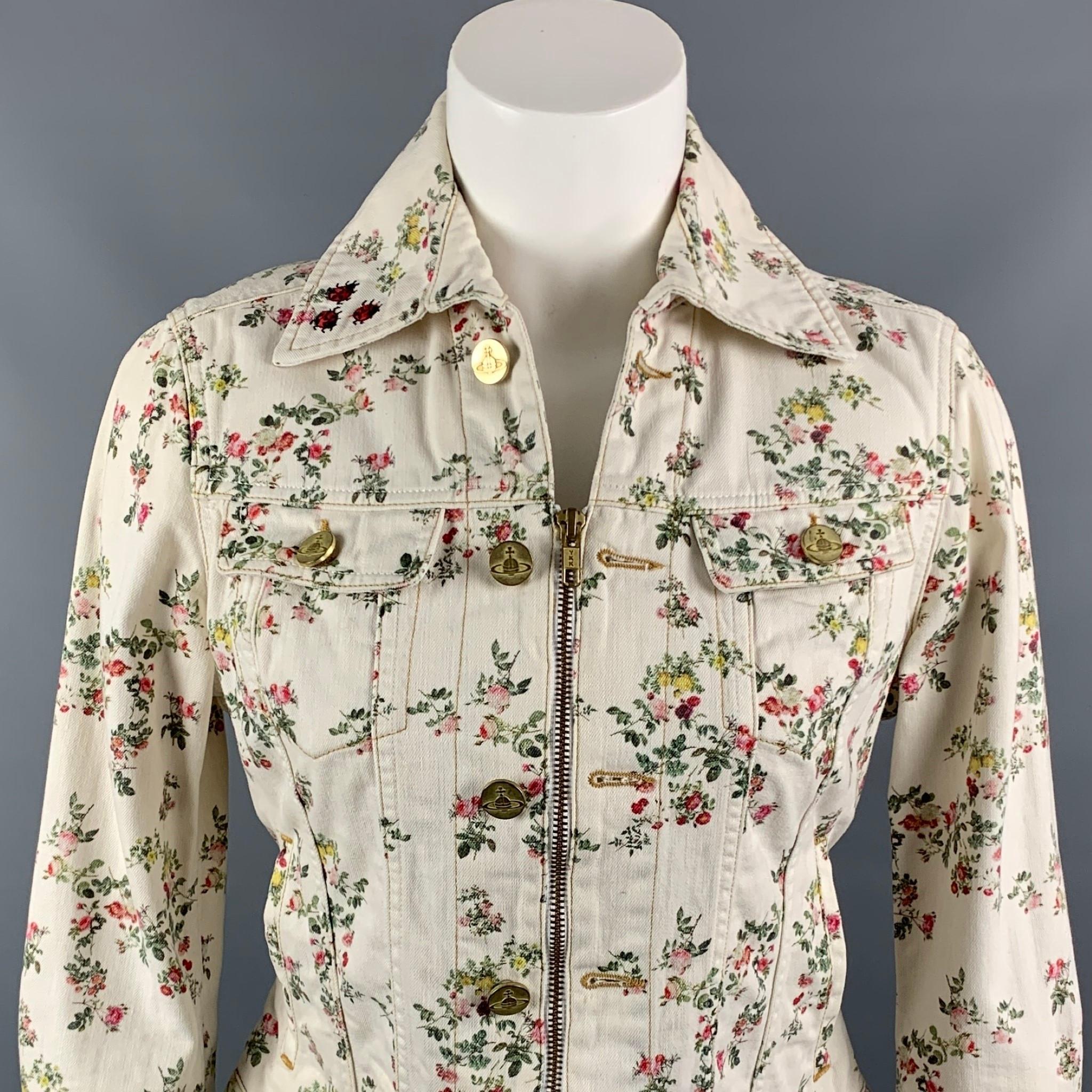 VIVIENNE WESTWOOD ANGLOMANIA x LEE jacket comes in a multi-color floral cotton featuring a trucker style, contrast stitching, gold tone button details, spread collar, and a full zip up closure.

Very Good Pre-Owned Condition.
Marked: