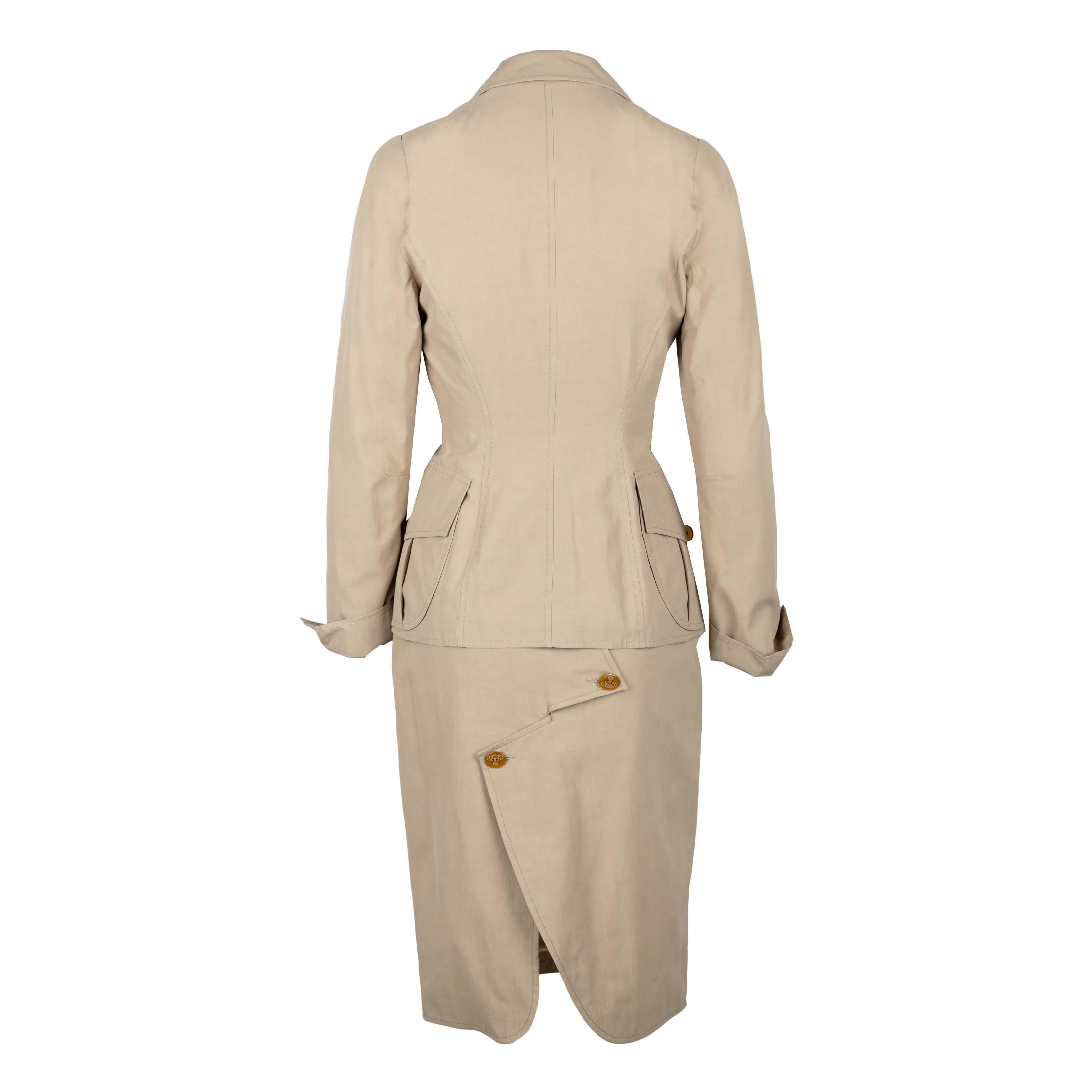 Vivienne Westwood red label jacket and skirt set in beige color, in a similar material of trench coats which makes it perfect for the mid-season use. The jacket has roomy front pockets, features a zigzag styled opening with orange buttons embossed