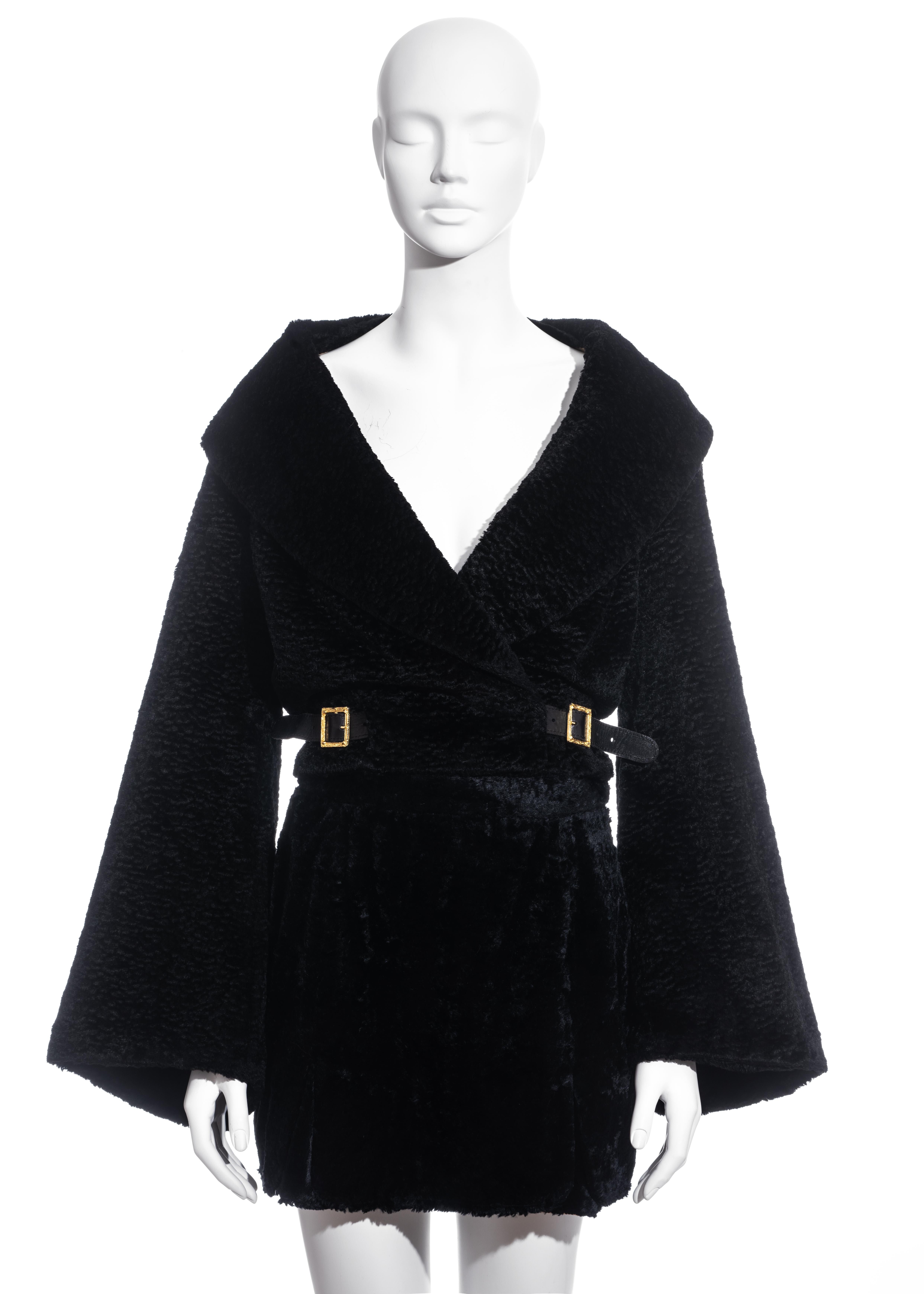 ▪ Vivienne Westwood mini skirt suit
▪ Chenille faux fur with an Astrakhan affect
▪ Wrap Jacket with bell sleeves 
▪ Gold Baroque-style square buckles with leather straps 
▪ Matching mini skirt 
▪ IT 42 - FR 38 - UK 10 - US 6
▪ Fall-Winter 1993 