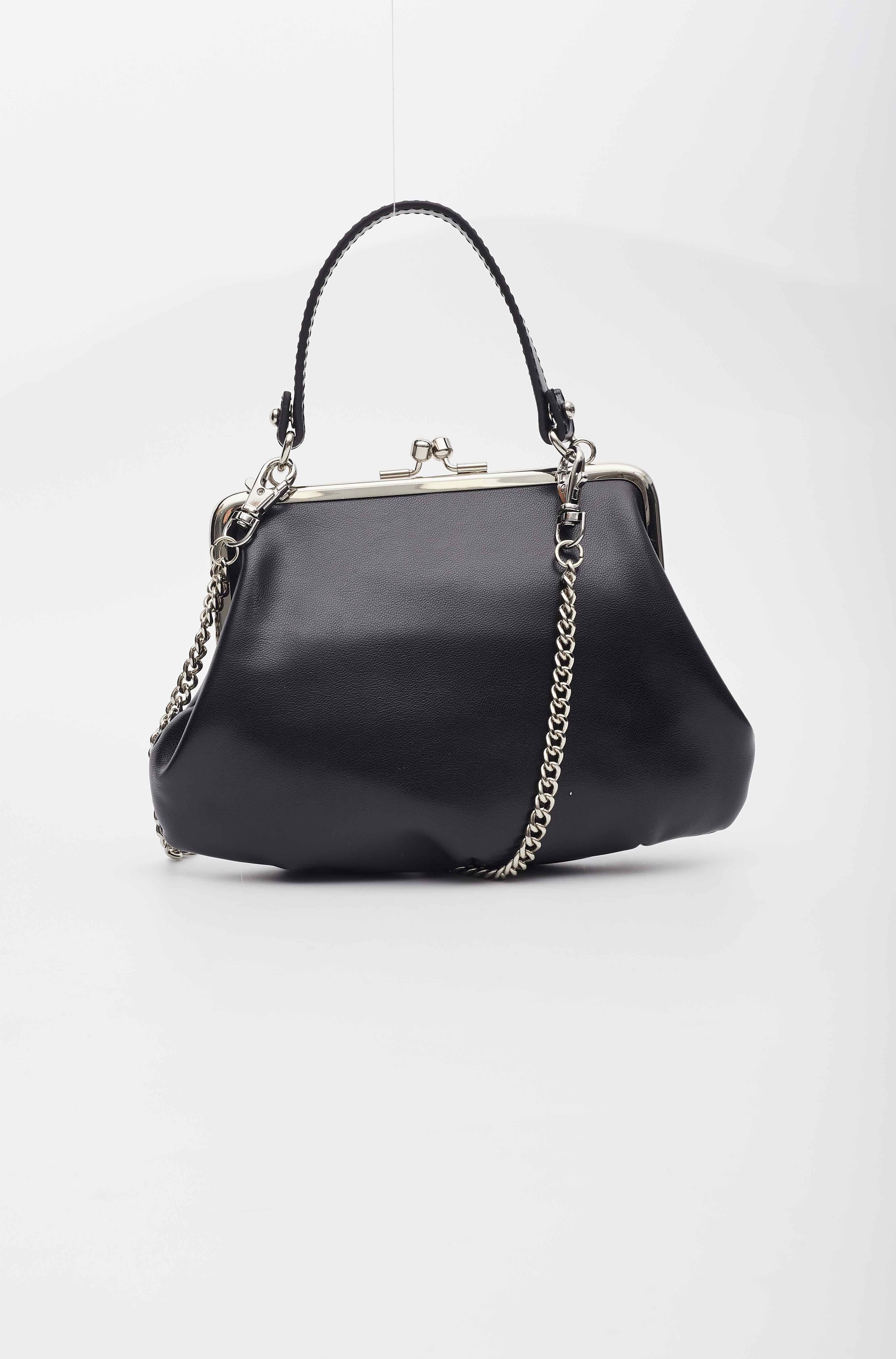 Black. Made from nappa leather. Silver hardware. Signature Orb plaque detail. Clasp fastening. Main compartment with logo cotton lining. Long top handle Detachable chain-link shoulder strap.

Material: Leather
Measures: Height 4.7” x Length 6.7” x