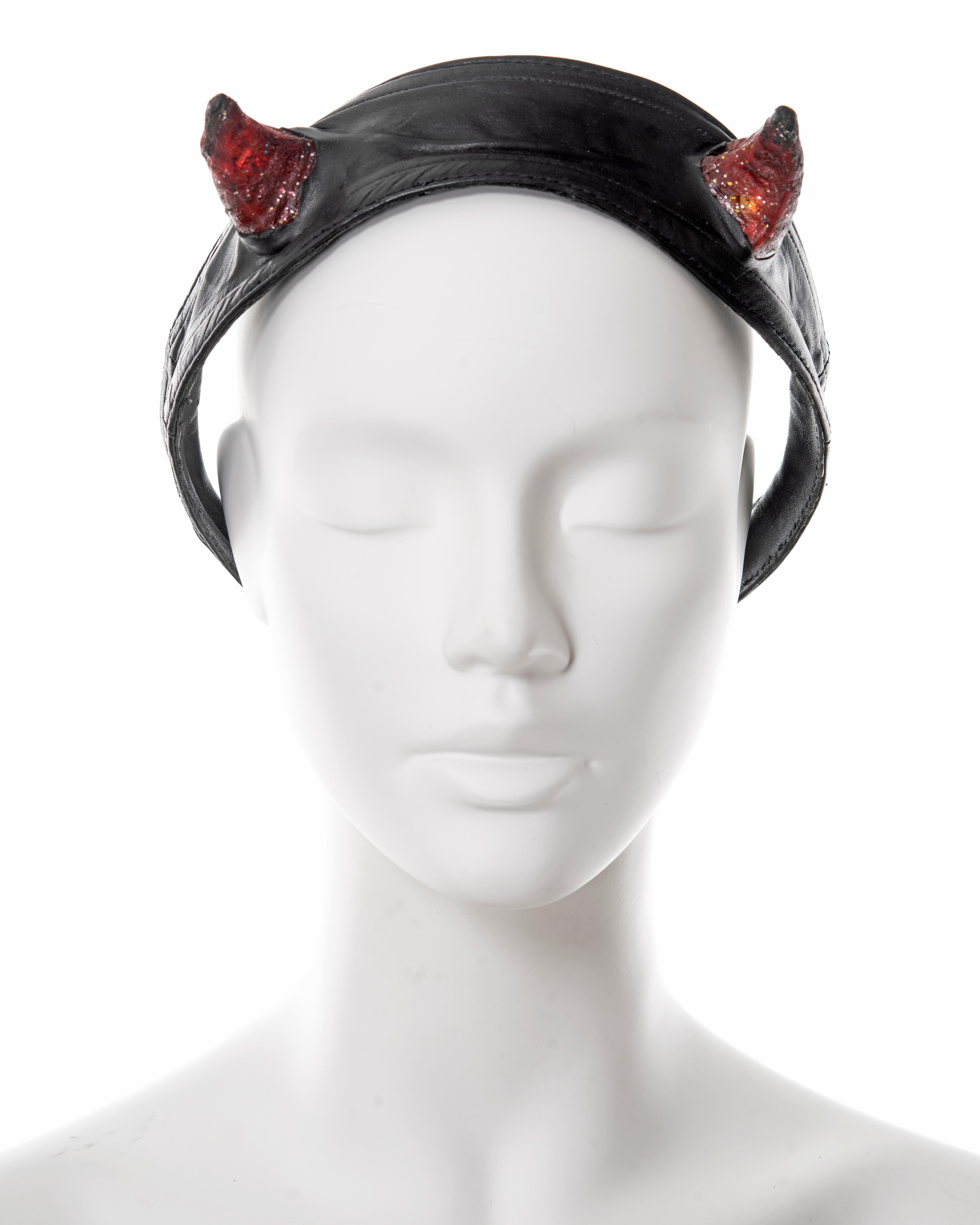 ▪ Vivienne Westwood black leather headband
▪ 'Britain Must Go Pagan', Spring-Summer 1988
▪ Battery-powered light-up acrylic Satyr horns 
▪ Unlabelled show piece
▪ First seen on the cover of Blitz Magazine, March 1988 and later shown at the