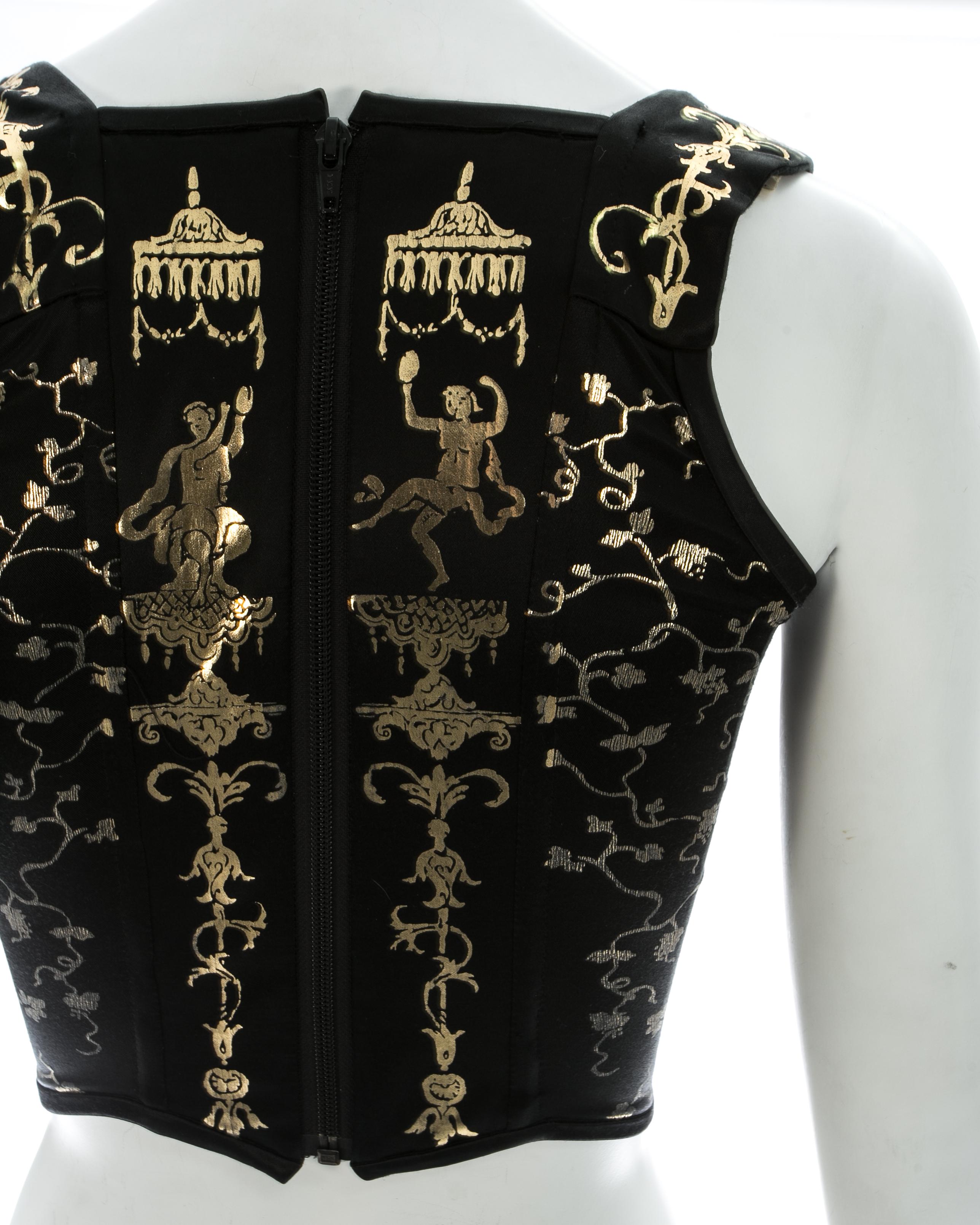 Black Vivienne Westwood black satin corset with metallic gold motifs, fw 1990