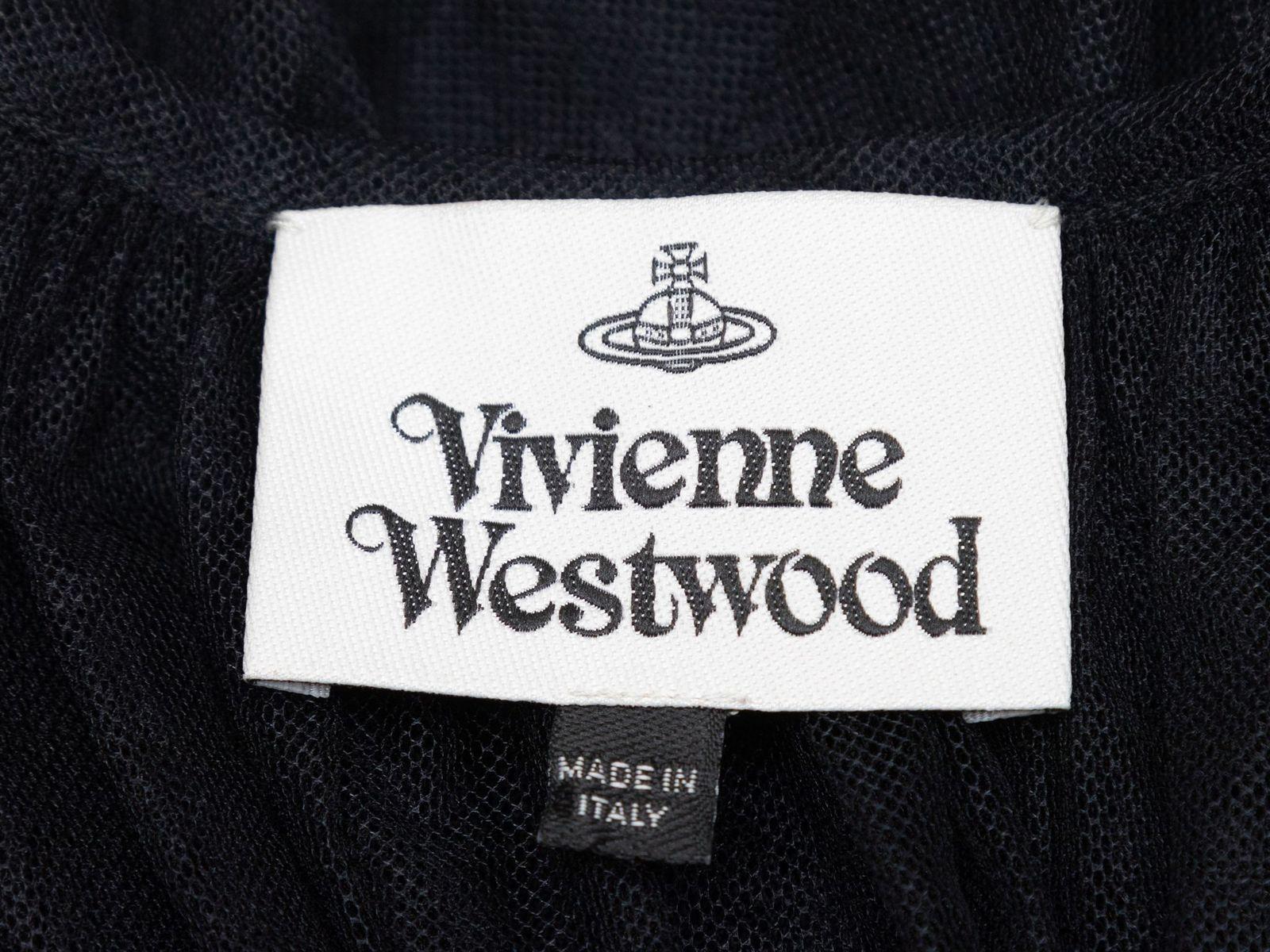 Product Details: Black sheer mesh peasant blouse by Vivienne Westwood. V-neck featuring tie accent. Long sleeves. Designer size 40. 42