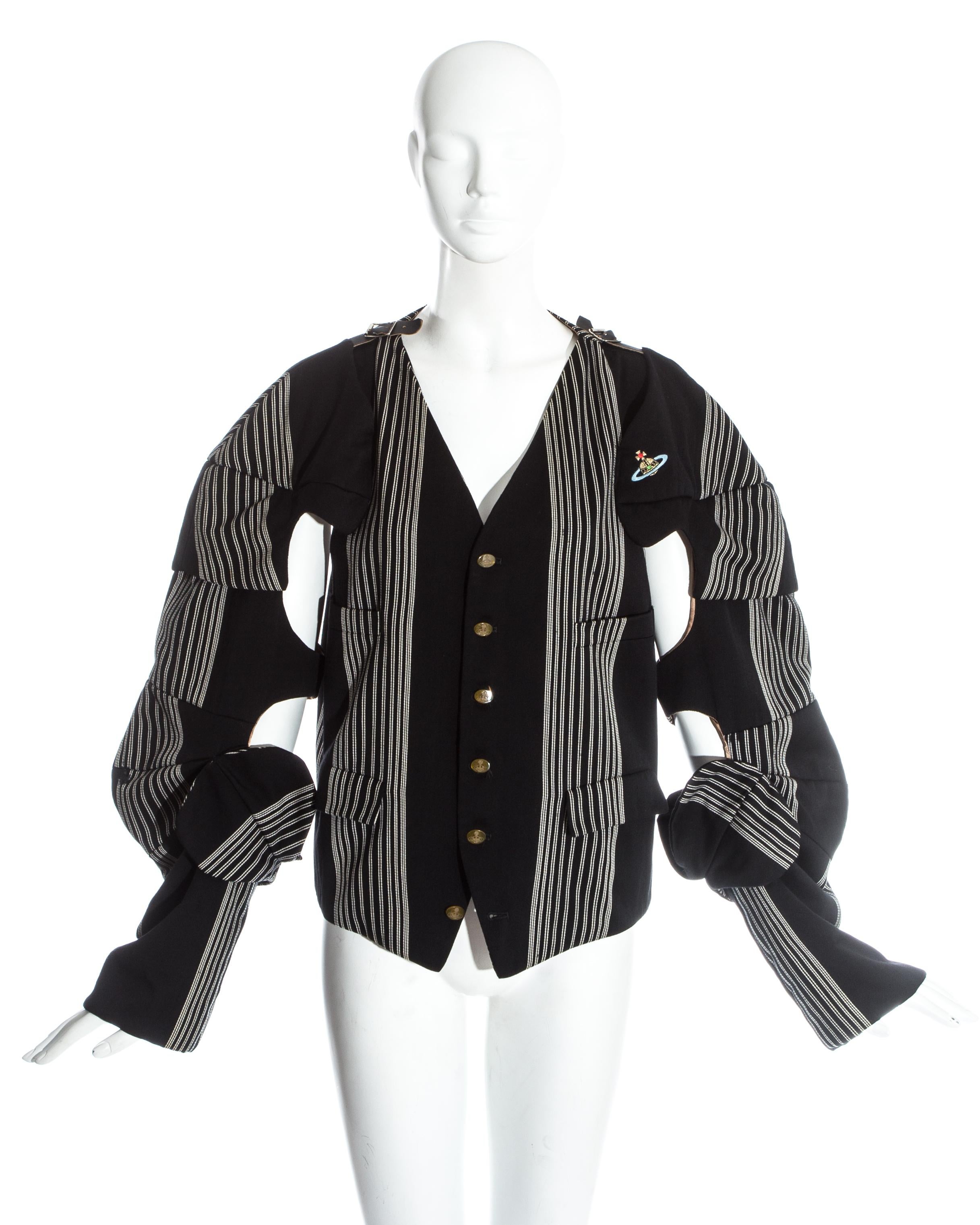 Vivienne Westwood, black and white striped wool Armour Jacket. Detachable sleeves with leather buckles, embroidered Orb on chest and signature Westwood buttons.

Time Machine, Fall-Winter 1989